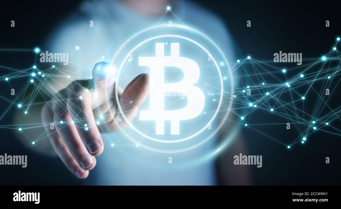 Homme d'affaires sur un arrière-plan flou en utilisant le rendu 3D de crypto-monnaie bitcoins Banque D'Images