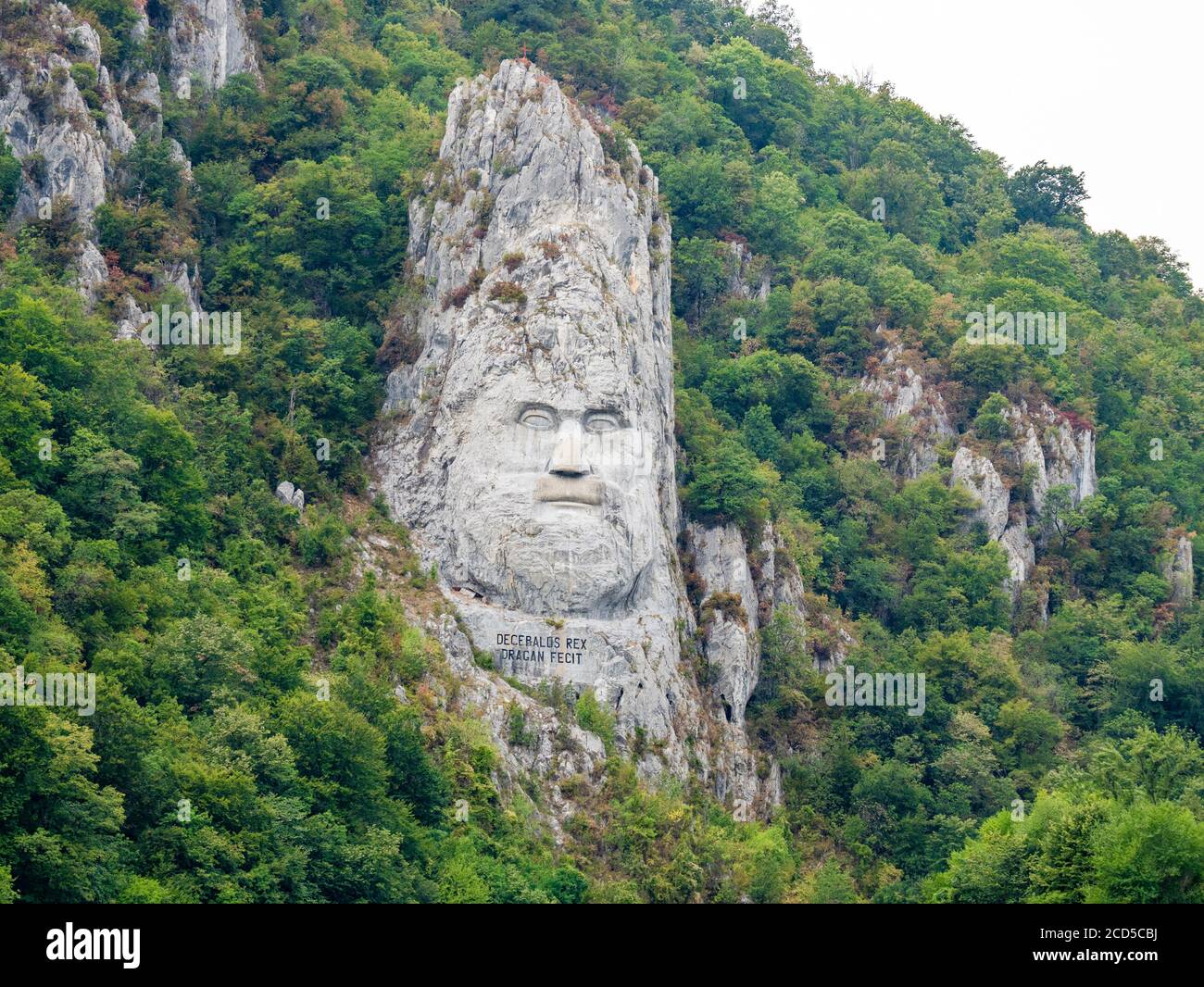Face sculptée dans le rocher, Orsova, Roumanie Banque D'Images