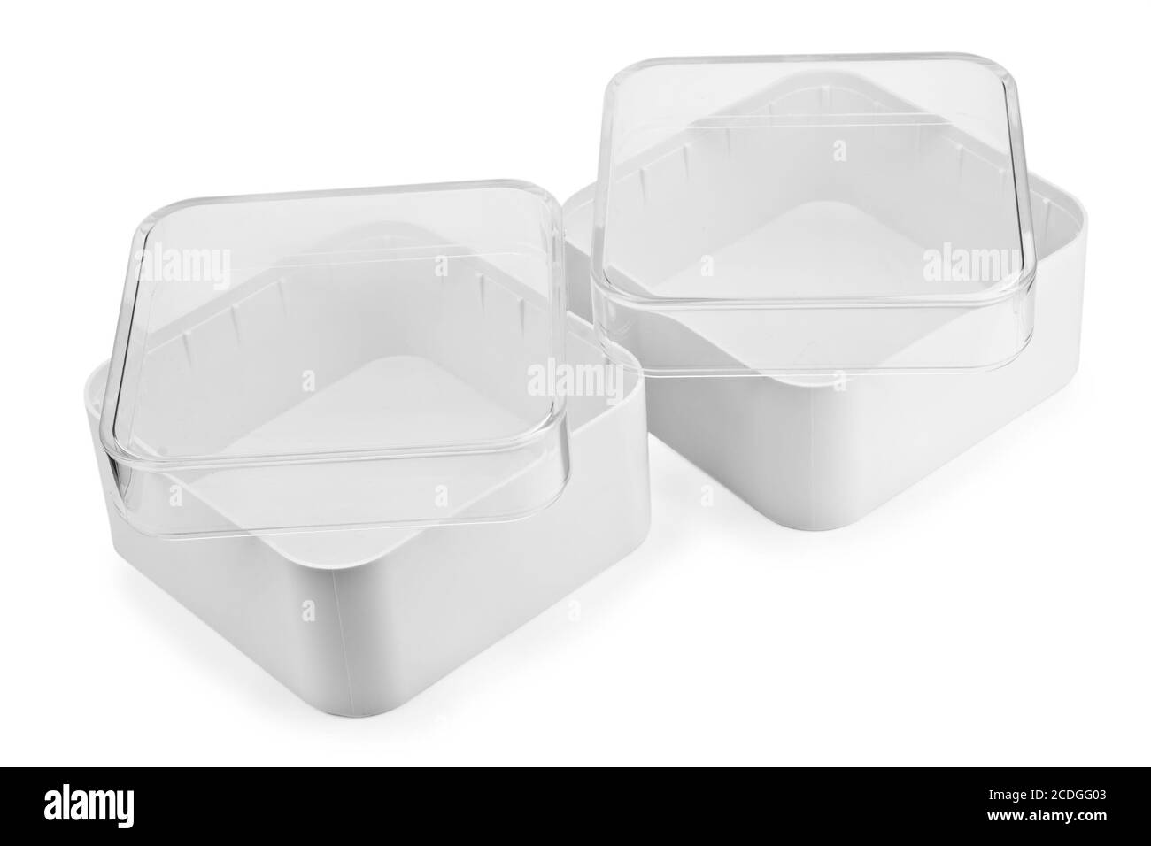 Petites boîtes isolées en plastique blanc Banque D'Images