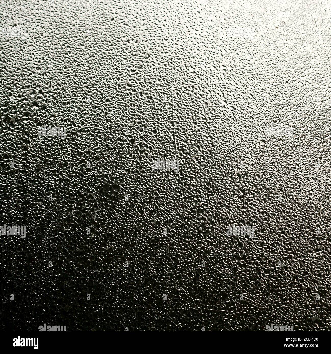 Contrôle de l'eau sur une vitre Banque D'Images