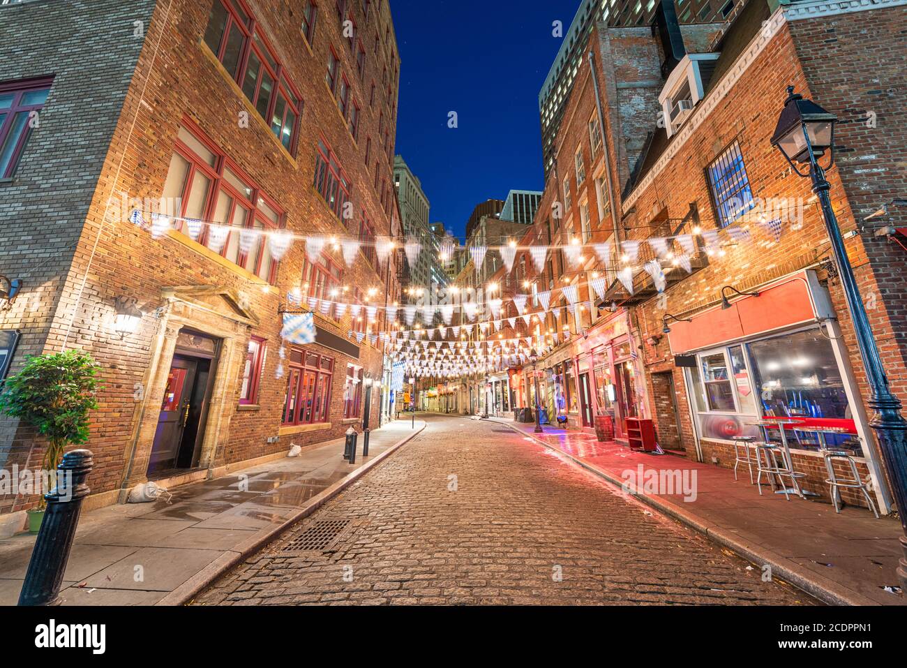 Stone Street, New York City, quartier des restaurants aux États-Unis la nuit. Banque D'Images