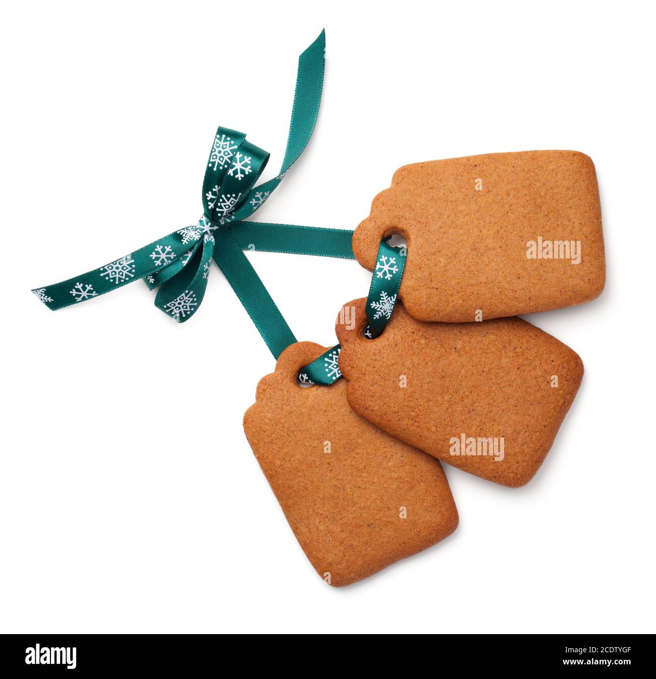 Gingerbread Cookies avec étiquette Ribbon Bow isolé sur fond blanc Banque D'Images