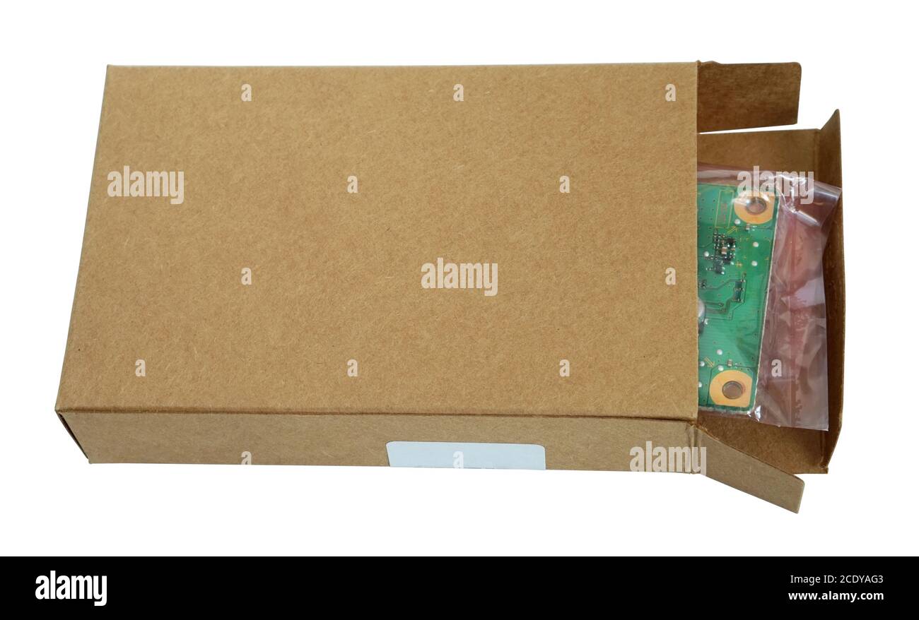 Pièces de rechange et composants électroniques emballés dans un film souple et boîte en carton Banque D'Images