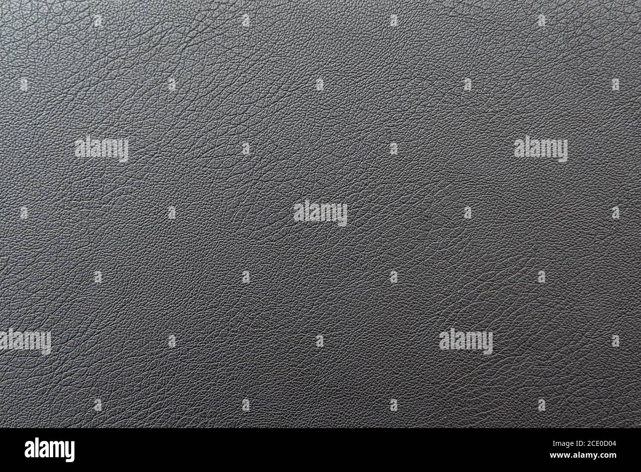 Cuir noir ou gris foncé comme texture, fond Banque D'Images