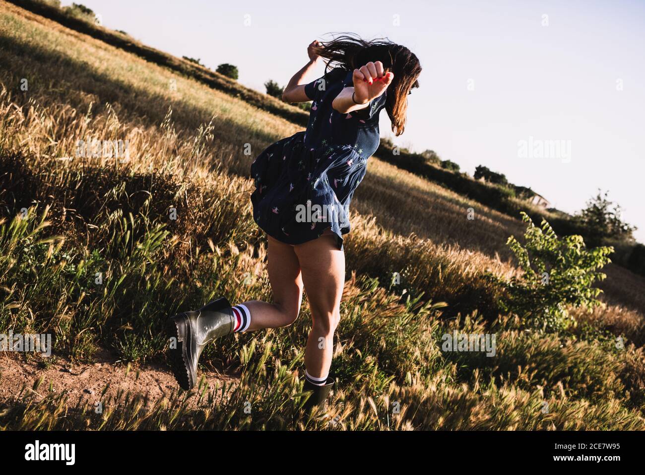 femme en bottes de caoutchouc