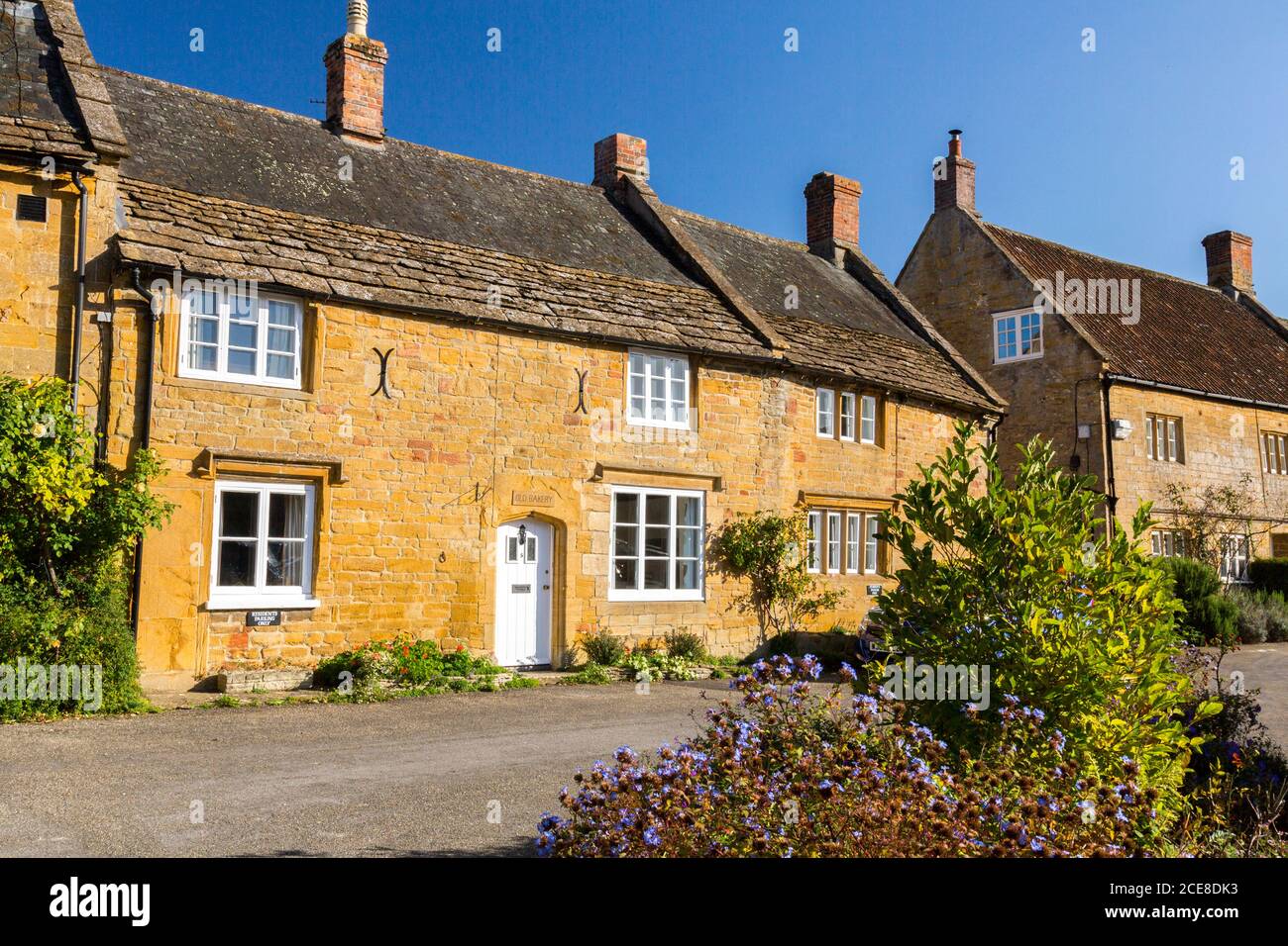 La vieille boulangerie est un cottage en pierre construit à partir de la pierre de jambon locale dans le centre du village de Montacute, Somerset, Angleterre, Royaume-Uni Banque D'Images
