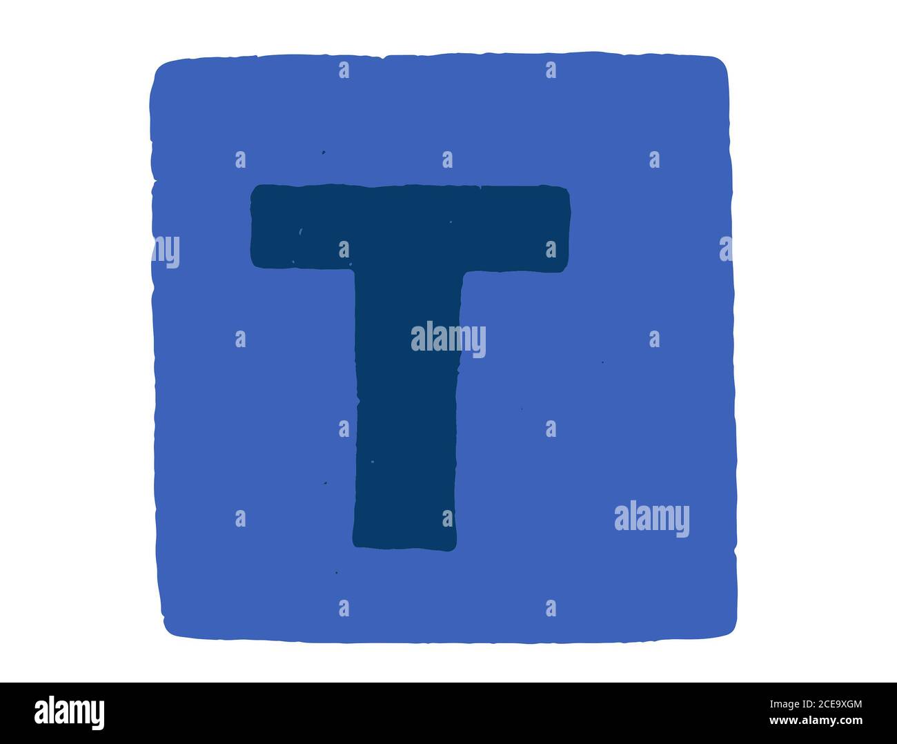 Cube de lettres de l'alphabet avec la lettre majuscule T sur un bleu arrière-plan Banque D'Images