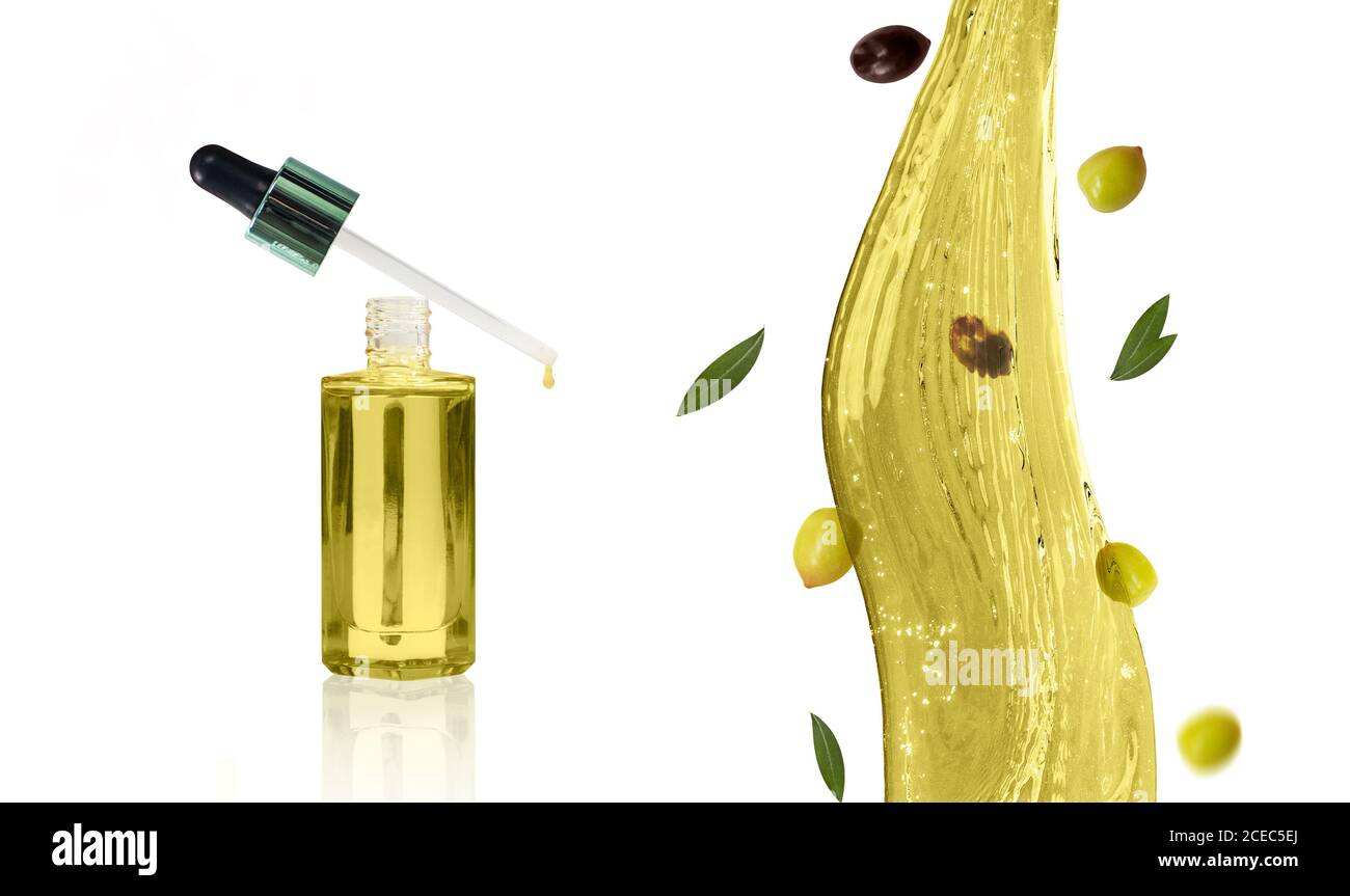 Bouteille et compte-gouttes remplis d'huile d'olive. Huile d'olive. Banque D'Images