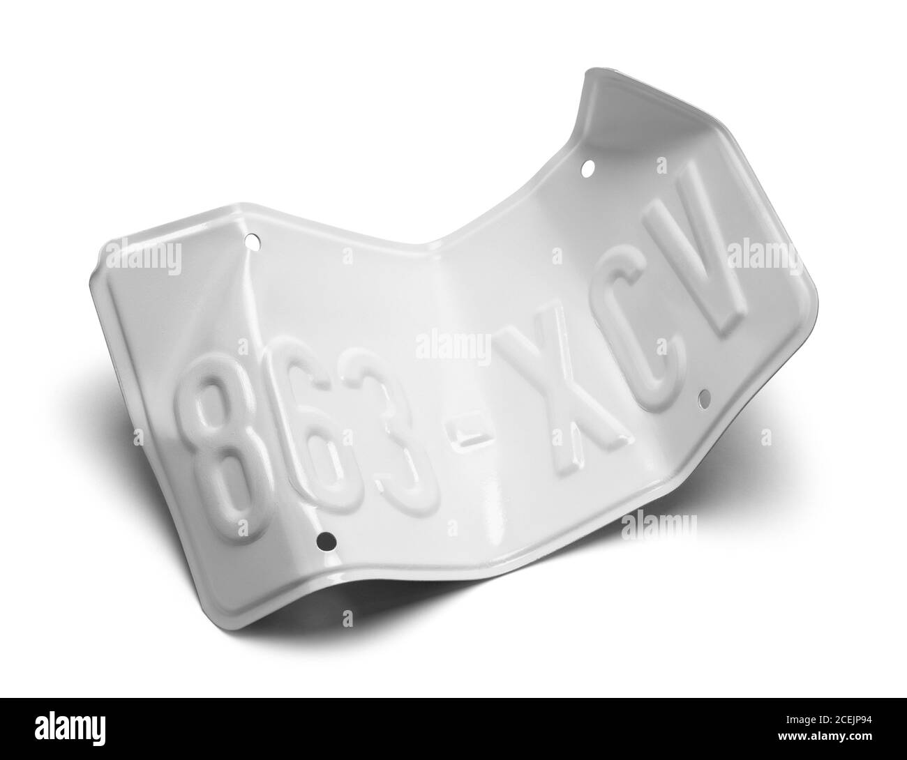 Plaque d'immatriculation pliée isolée sur fond blanc. Banque D'Images