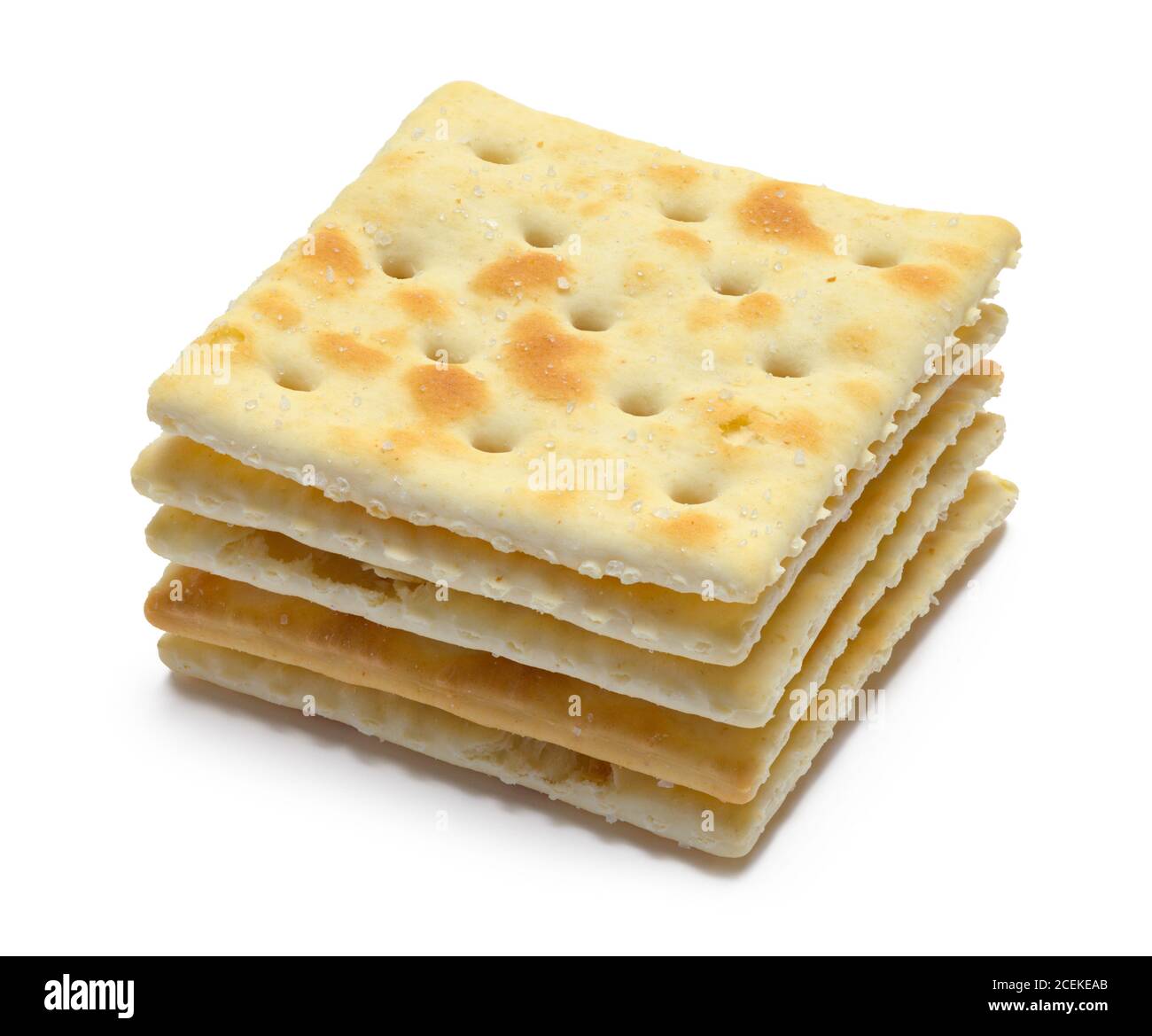 Petite pile de craquelins Saltine isolés sur blanc. Banque D'Images