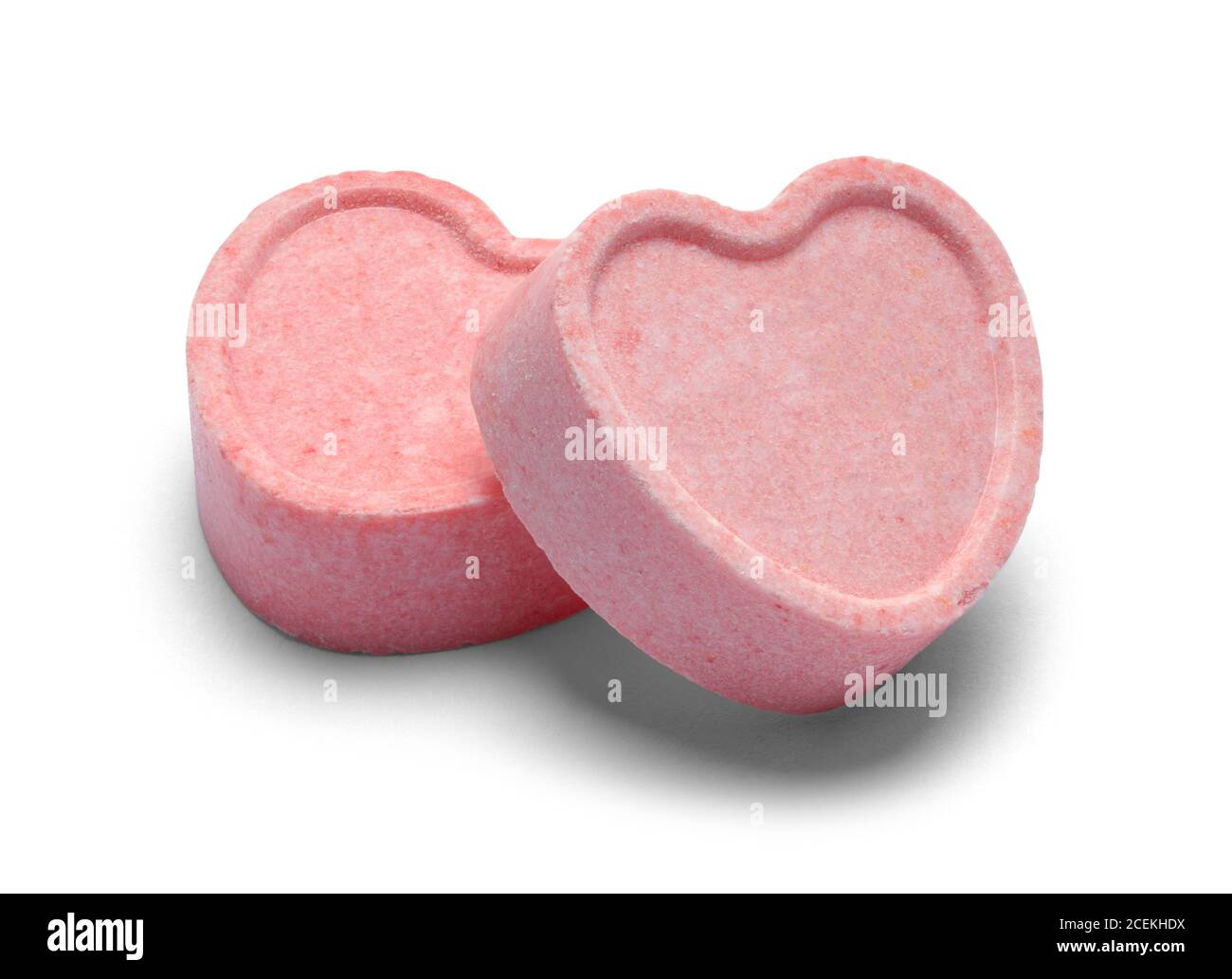 Deux Bonbons Coeur Pink Valentines isolé sur blanc. Banque D'Images