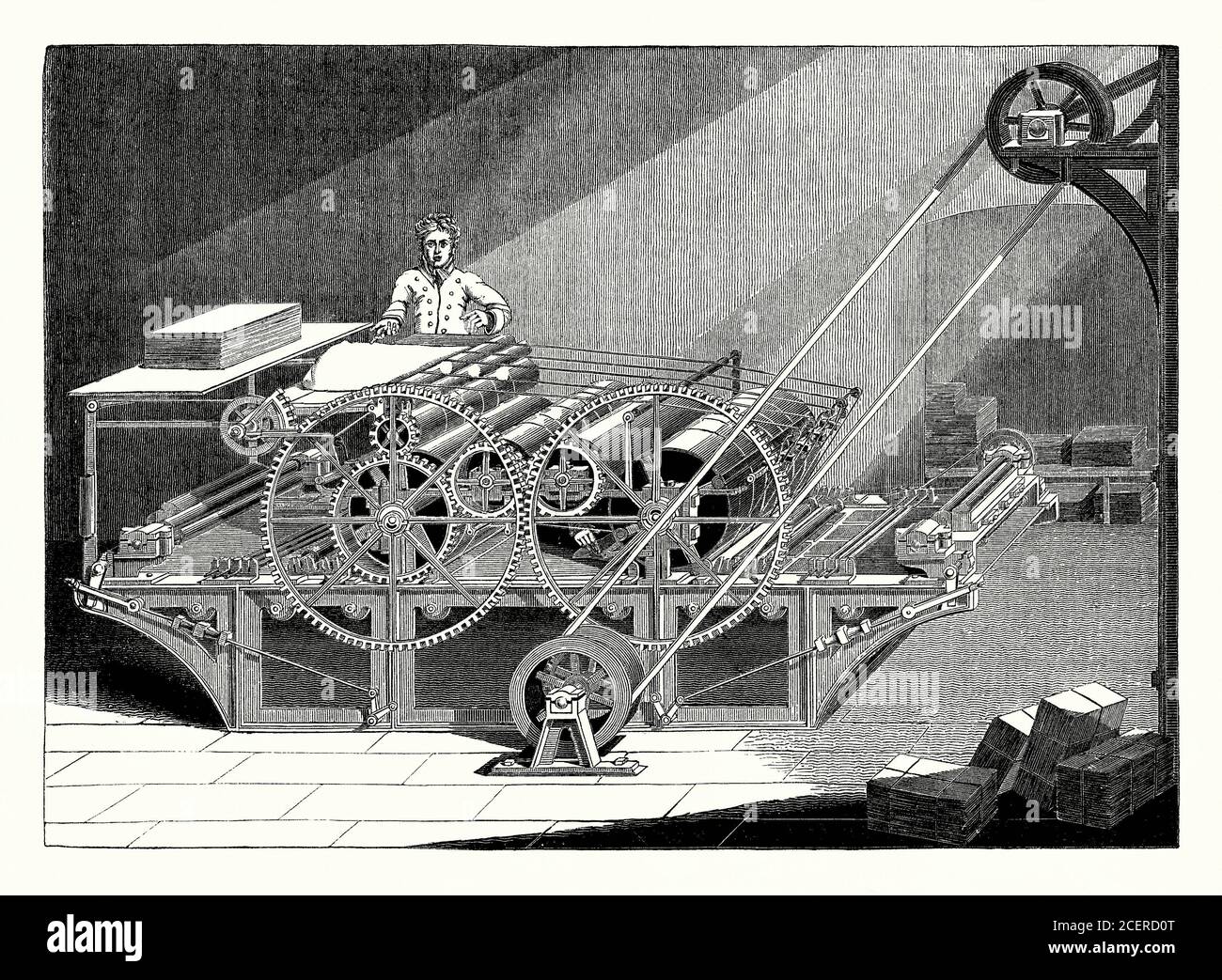 Une ancienne gravure datant du XIXe siècle d'une presse rotative à impression cylindrique à vapeur qui a été utilisée dans la révolution industrielle de l'époque victorienne. Les Allemands Friedrich Koenig et Andreas Bauer ont conçu et construit leur première presse cylindrique au début des années 1800. Il était beaucoup plus rapide que les presses à plat existantes. L'un de leurs premiers clients était John Walter du journal The Times. Le premier numéro du Times qui utilisait les nouvelles presses a été publié en 1814. La presse a été installée en secret pour éviter le sabotage par des travailleurs mécontents de la presse (luddites) qui exploitaient les presses existantes. Banque D'Images