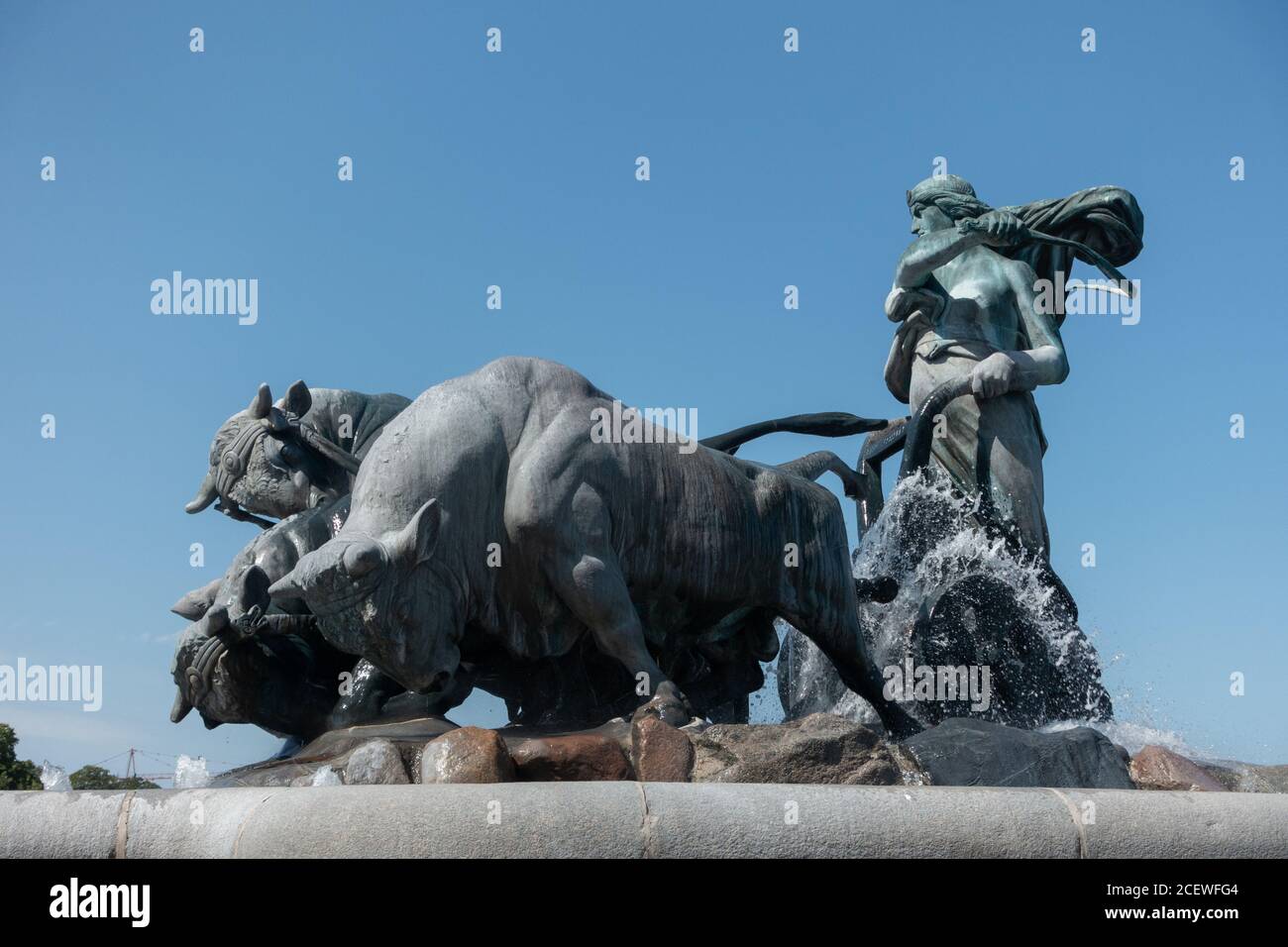 La statue de la déesse à la tête de la fontaine Gefion À Copenhague Banque D'Images