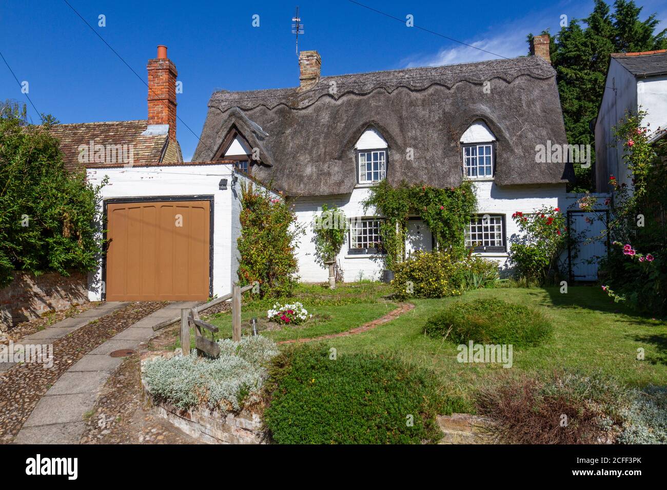 Belle maison de chaume à Grantchester, un village pittoresque à côté de la rivière Cam, Cambridgeshire, Royaume-Uni. Banque D'Images