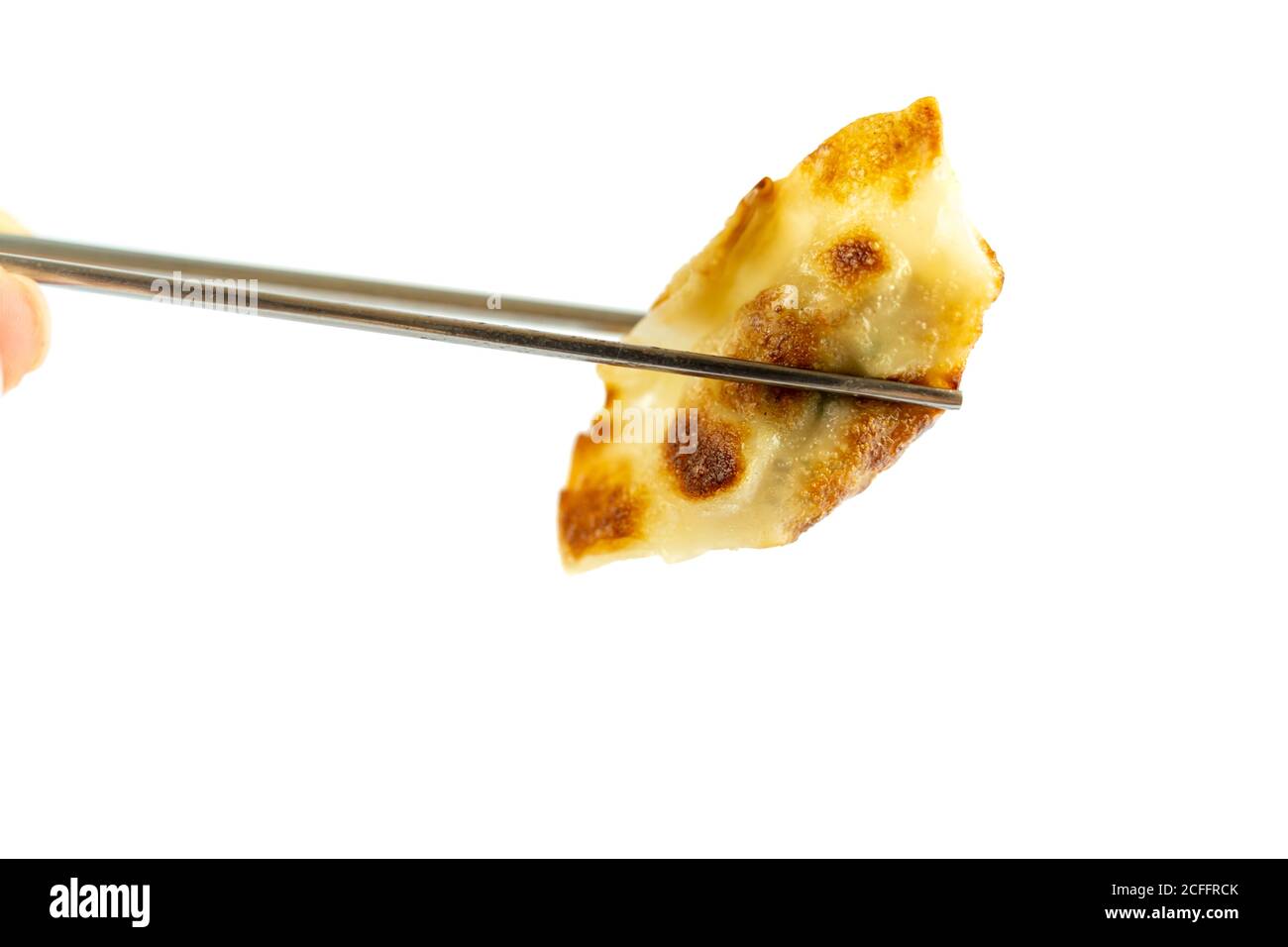 Les boulettes étaient bien frites dans une casserole couverte d'huile de cuisson et servies sur une assiette. Banque D'Images
