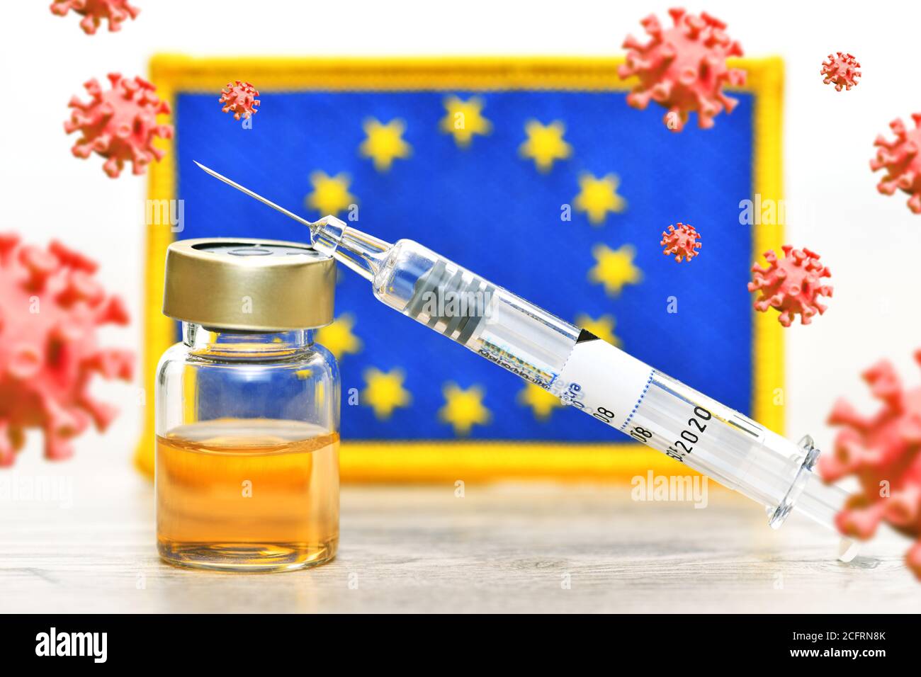 Seringue, vaccin corona et virus corona devant le drapeau de l'UE, vaccin COVID-19 Banque D'Images