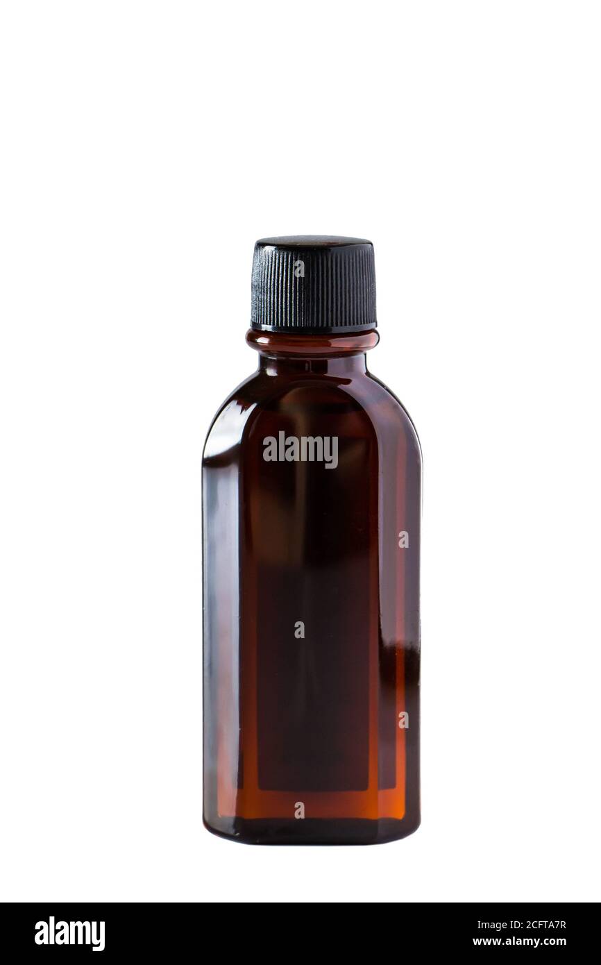 Bouteille d'huile aromatique sur fond blanc. Cosmétiques pour la thérapie de spa. Banque D'Images