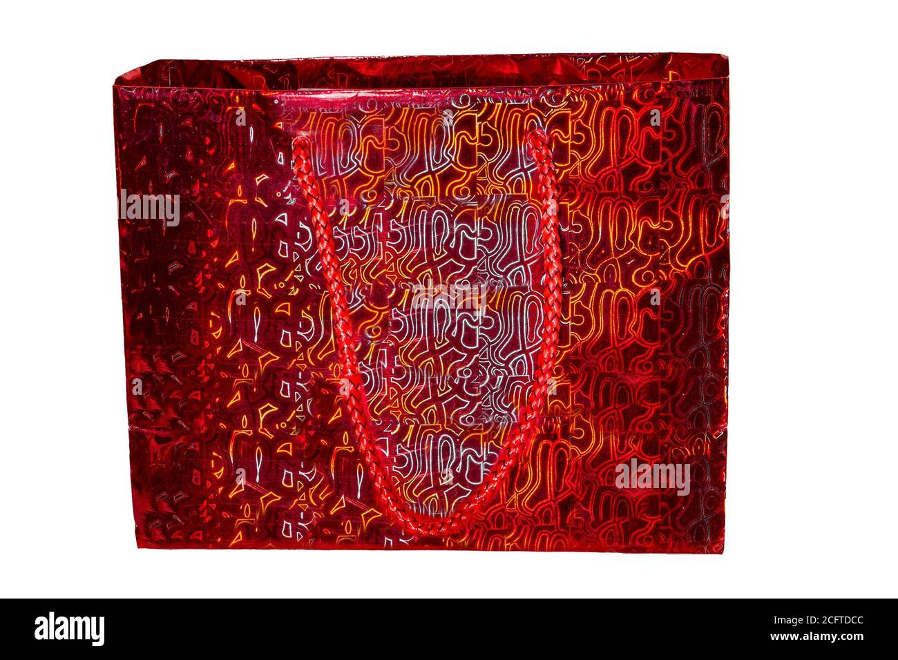 Sac cadeau rouge brillant isolé sur fond blanc Banque D'Images