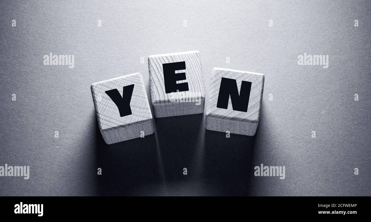 Yen Word écrit sur des cubes en bois Banque D'Images