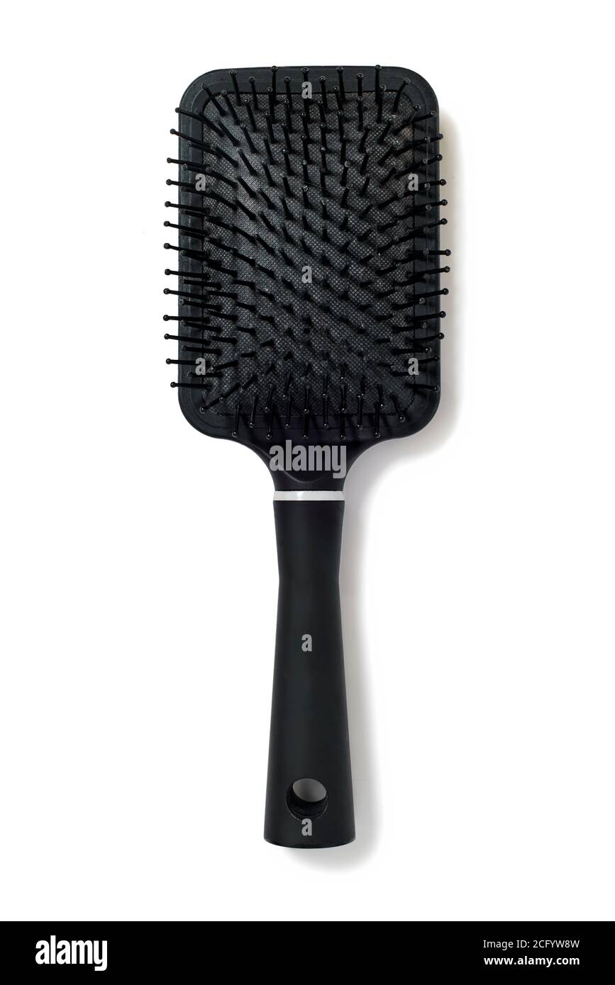 Photographie aérienne d'une brosse à cheveux en plastique noir isolée sur fond blanc Banque D'Images