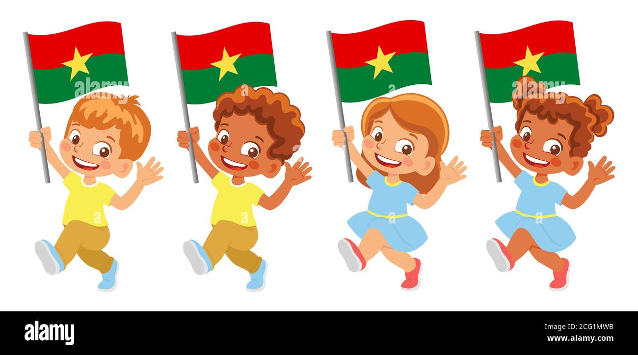 Drapeau Burkina Faso en main. Drapeau de retenue des enfants. Drapeau national du Burkina Faso Banque D'Images