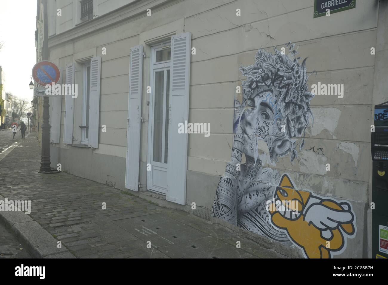 Art de rue sur une allée pavée à Paris, pasakdek Banque D'Images