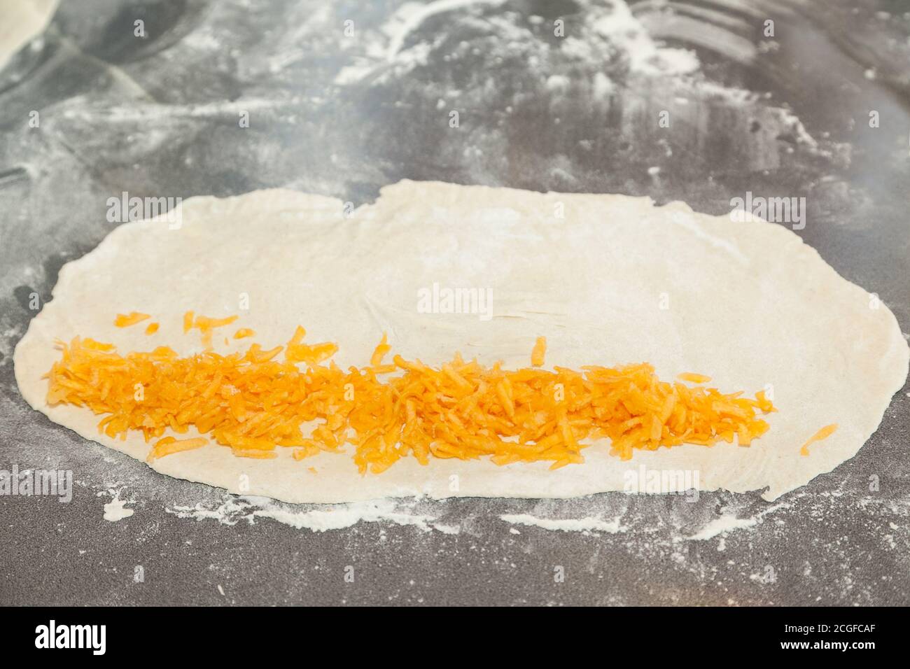 pâte roulée à la citrouille et au sucre râpés Banque D'Images