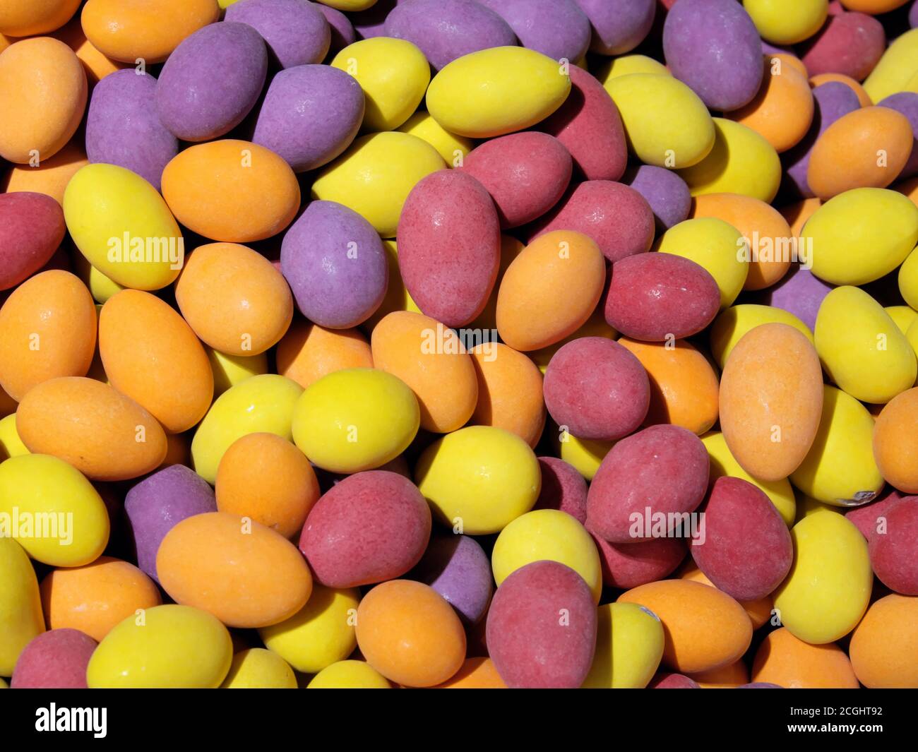 A pile of colorful sweets as a background. Candy close-up. Banque D'Images