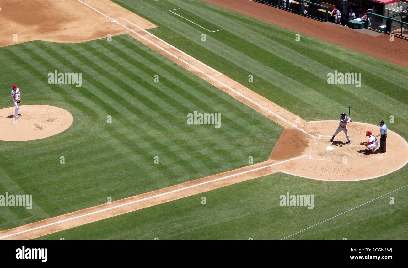 Un pichet de baseball sur le point de libérer le terrain de la batte. Banque D'Images