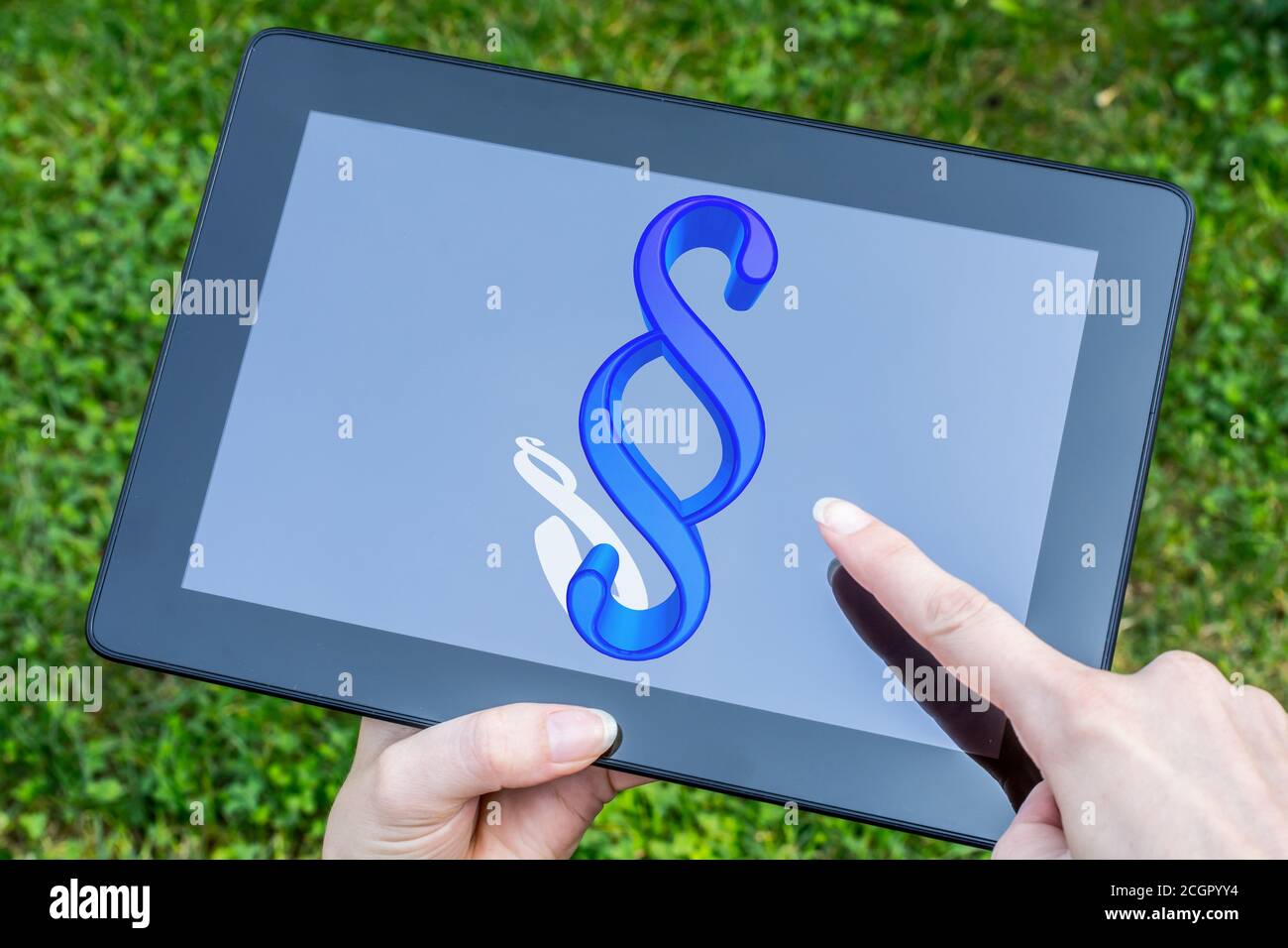 Illustration d'un signe de paragraphe bleu avec ombre sur un écran de la tablette Banque D'Images