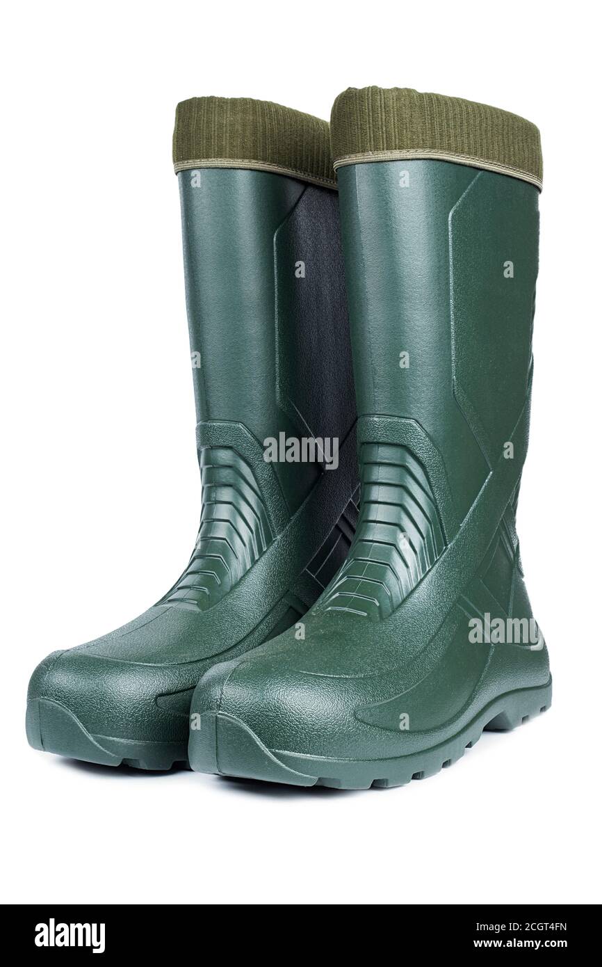 Bottes en caoutchouc vert isolé sur fond blanc. Banque D'Images