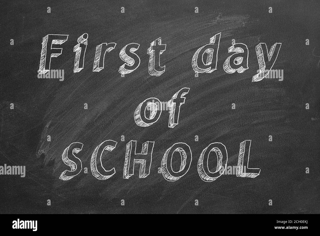 Dessin à la main du texte « First Day of School » sur le tableau noir Banque D'Images