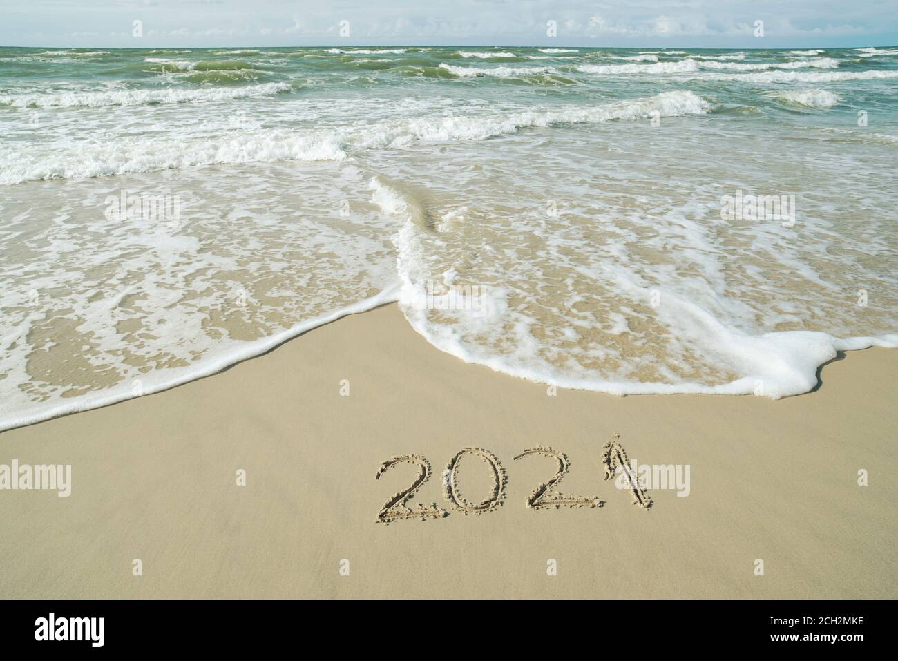 2021 inscription écrite sur le sable, concept du nouvel an à venir Banque D'Images