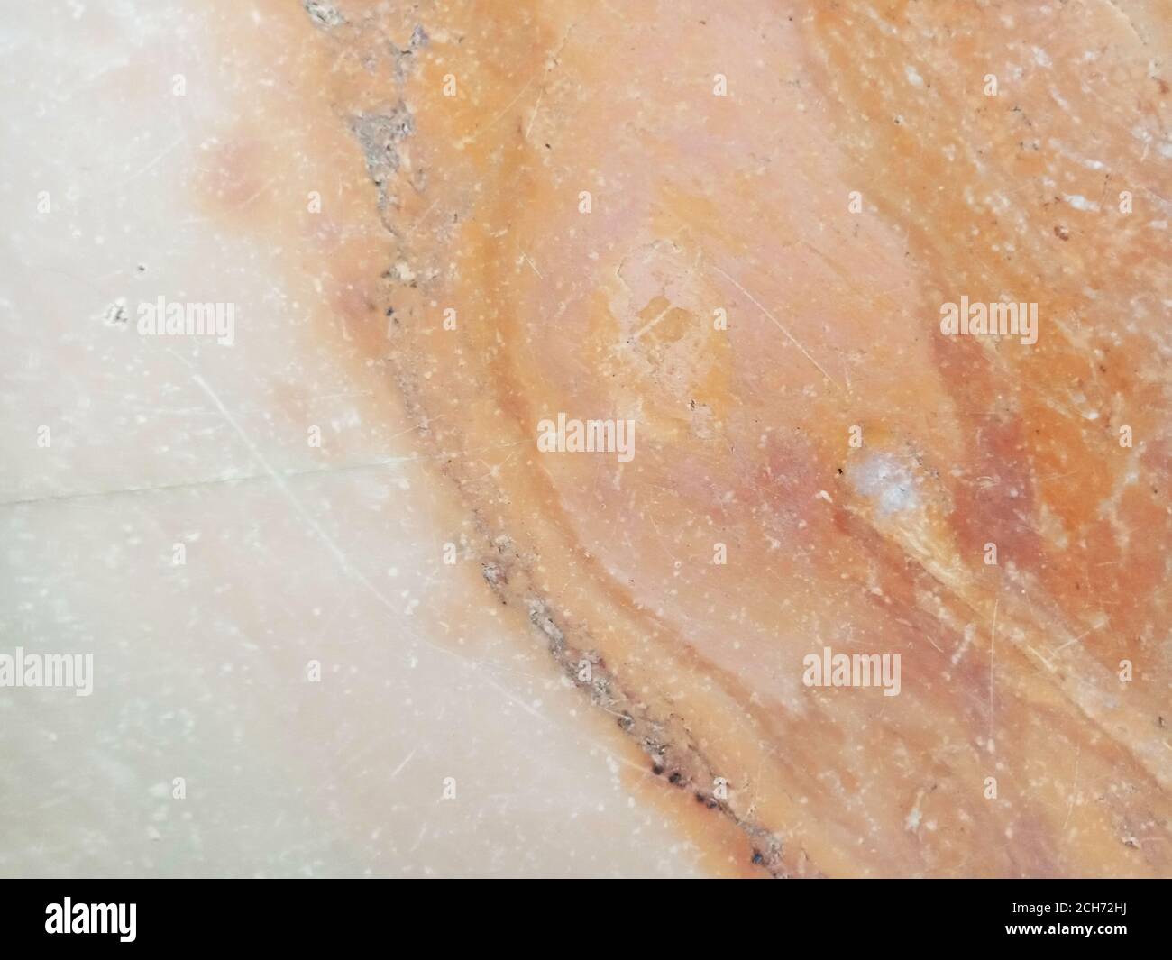 Marbre naturel en fond rose-orange - texture. Banque D'Images