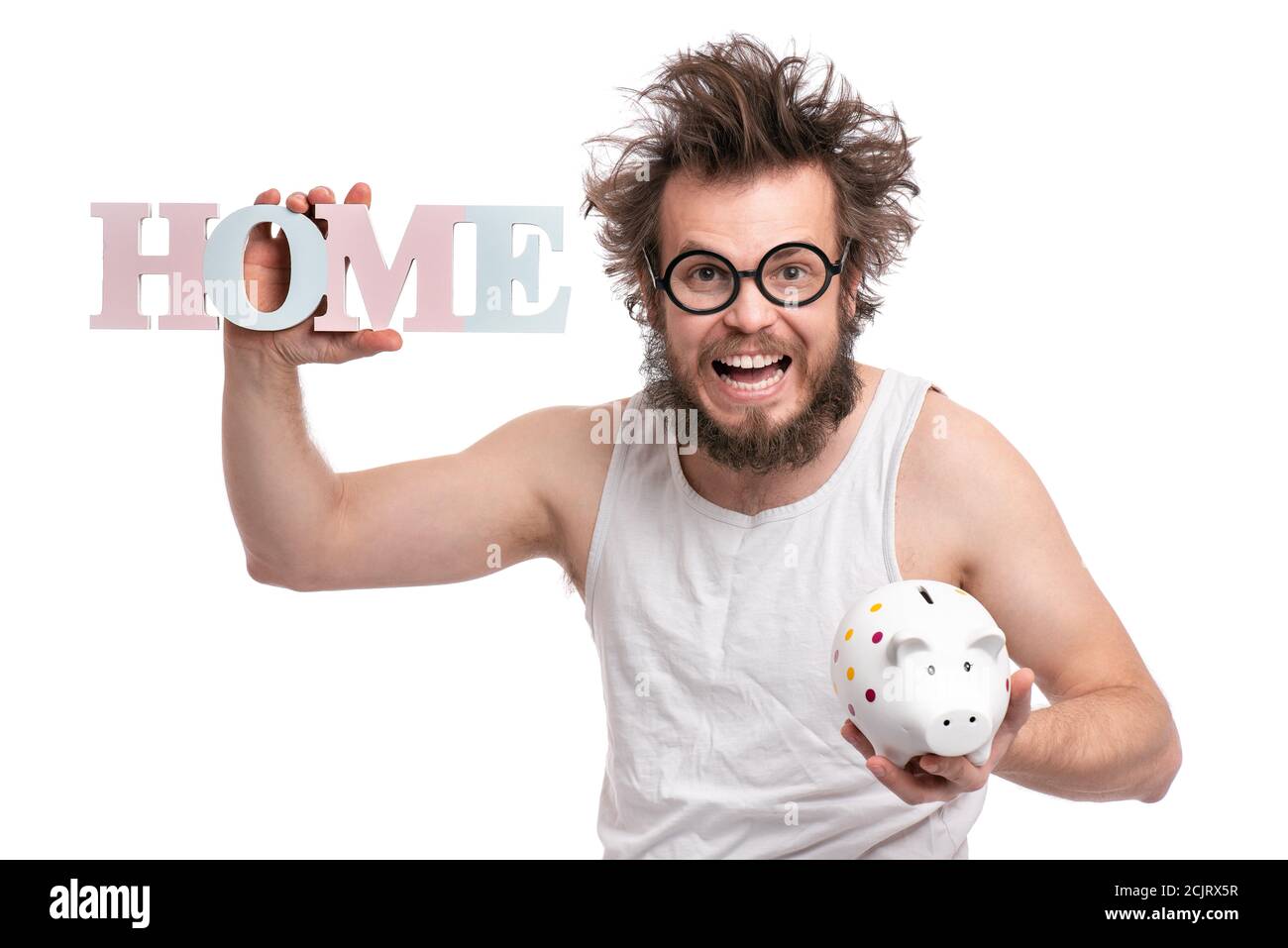 Homme barbu fou avec piggy Bank Banque D'Images