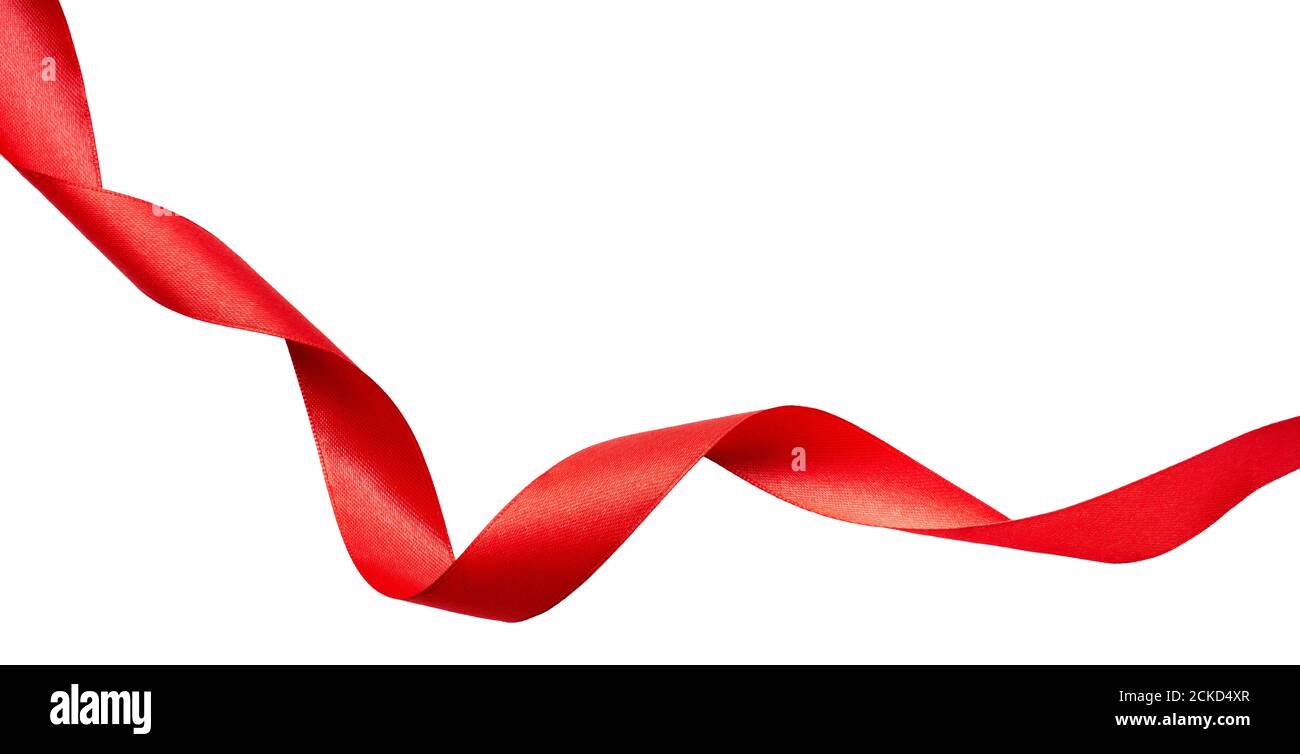 Un ruban rouge curly pour Noël et anniversaire présente bannière isolée sur un fond blanc. Banque D'Images
