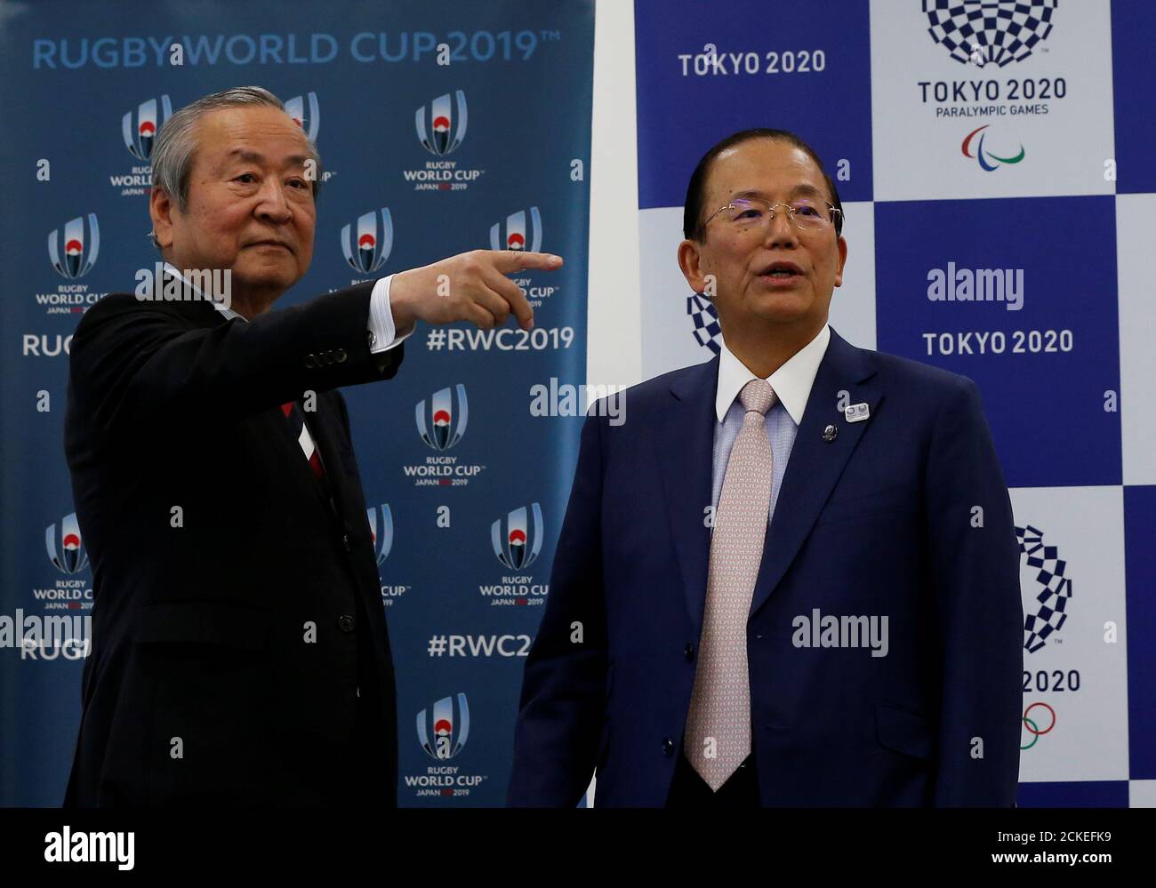 Toshiro Muto (R), CEO of Tokyo 2020 Organizing Committee of Olympic and  Paralympic games, and Akira Shimazu, CEO of the Rugby World Cup 2019  Organizing Committee, attend their signing ceremony on their