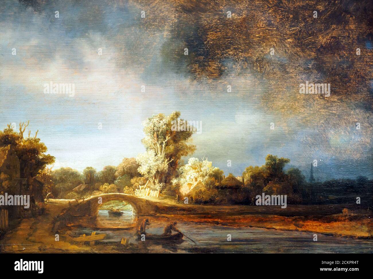Paysage avec un pont de pierre par Rembrandt Harmensz van Rijn (1606-1669) huile sur le panneau (1638) Banque D'Images