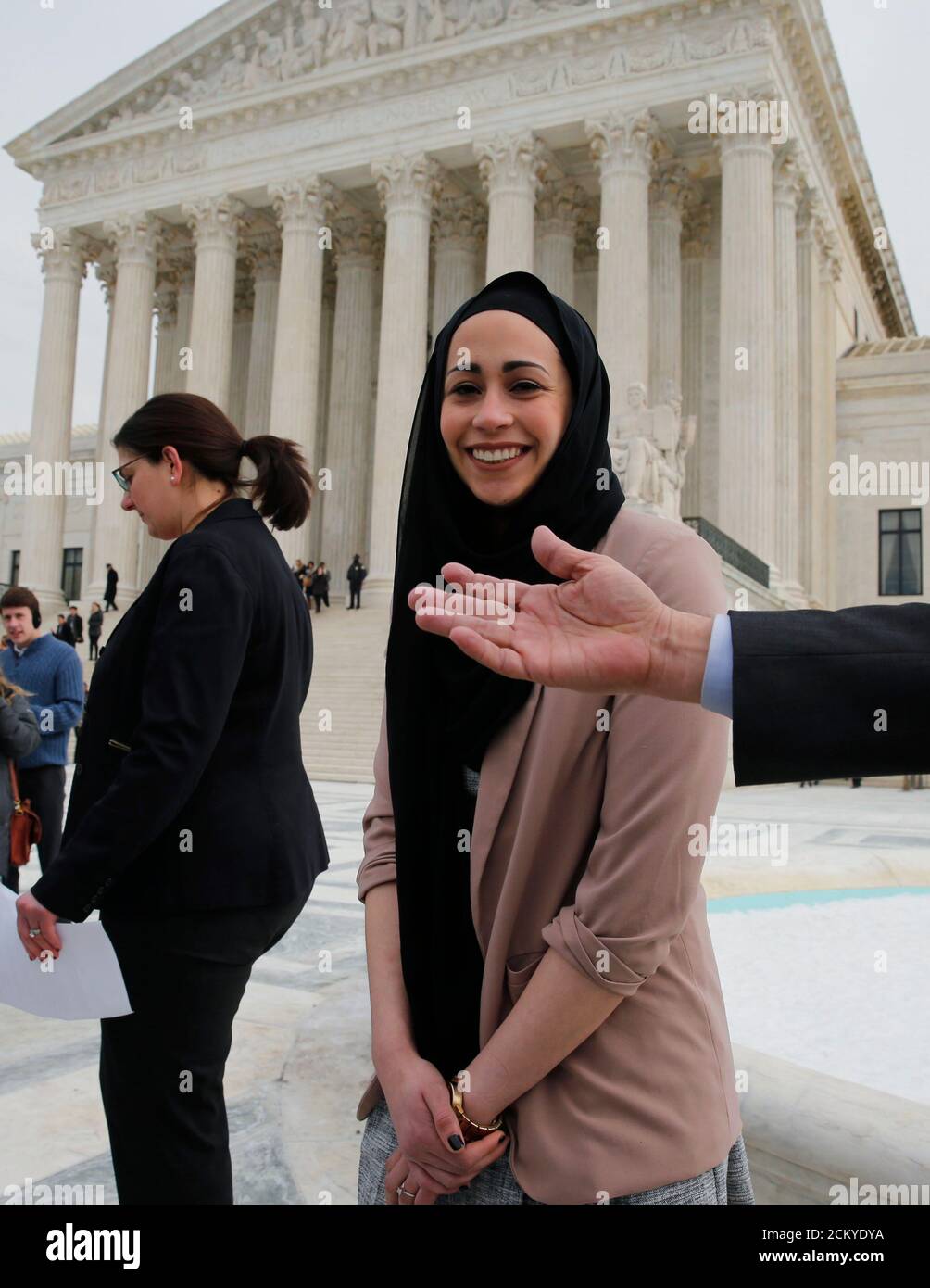 Muslim woman Samantha Elauf (R), who was denied a sales job at an  Abercrombie Kids store in Tulsa in 2008, stands with U.S. Equal Employment  Opportunity Commission (EEOC) lead attorney Barbara Seely (