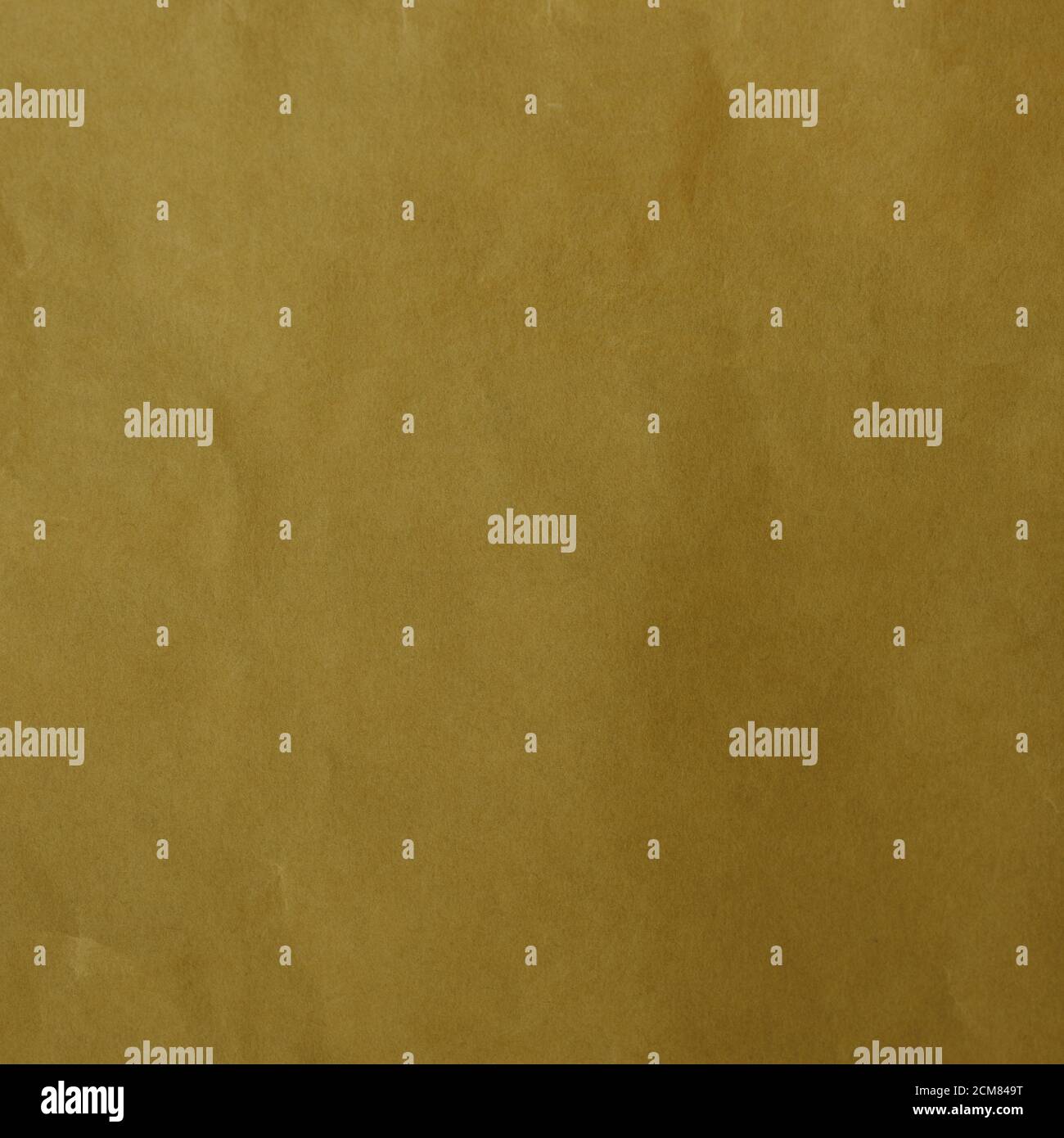 beau papier moutarde doré et abstrait de couleur jaune foncé sur fond de papier. Banque D'Images