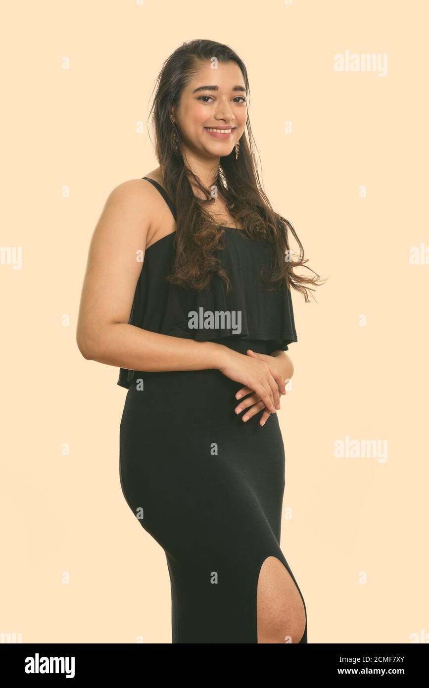 Young happy woman smiling while standing together Banque D'Images