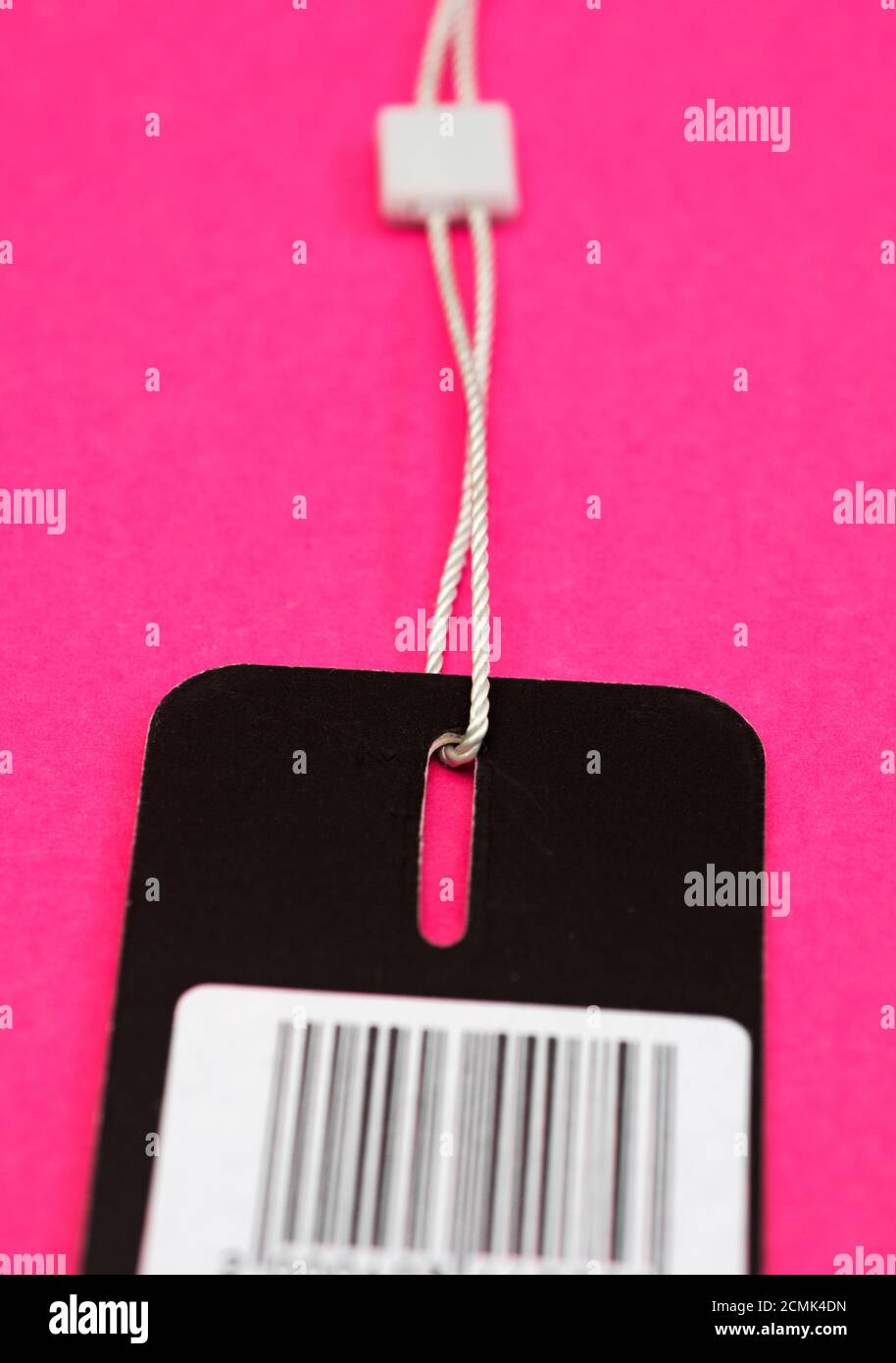 Vêtements tag avec code barre Banque D'Images