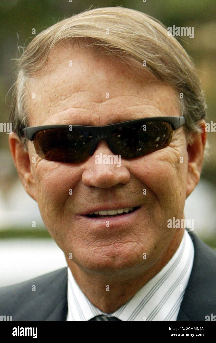 Country singer Glen Campbell arrives at the memorial service for musician  Ray Charles at the First African Methodist Episcopal Church in Los Angeles,  June 18, 2004. Charles, who overcame poverty, blindness and