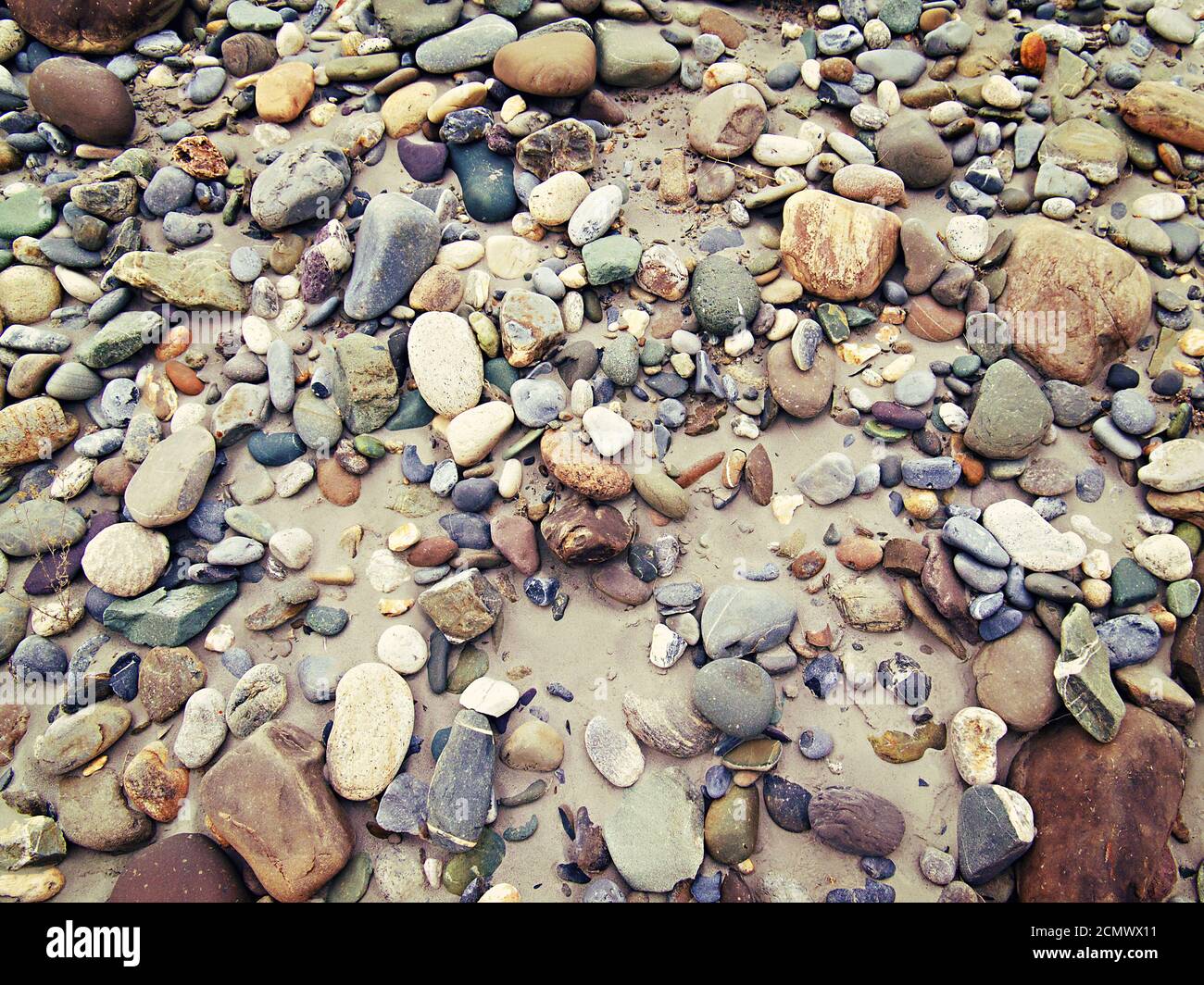 Les pierres de couleur et de sable dans l'arrière-plan Banque D'Images