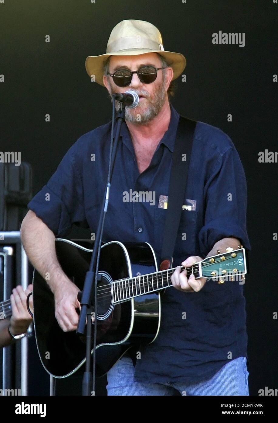 Italian artist Francesco De Gregori performs at Live 8 Italy concert inside  Rome's ancient Circus Maximus July 2, 2005. A galaxy of rock and roll stars  will grace stages across the globe