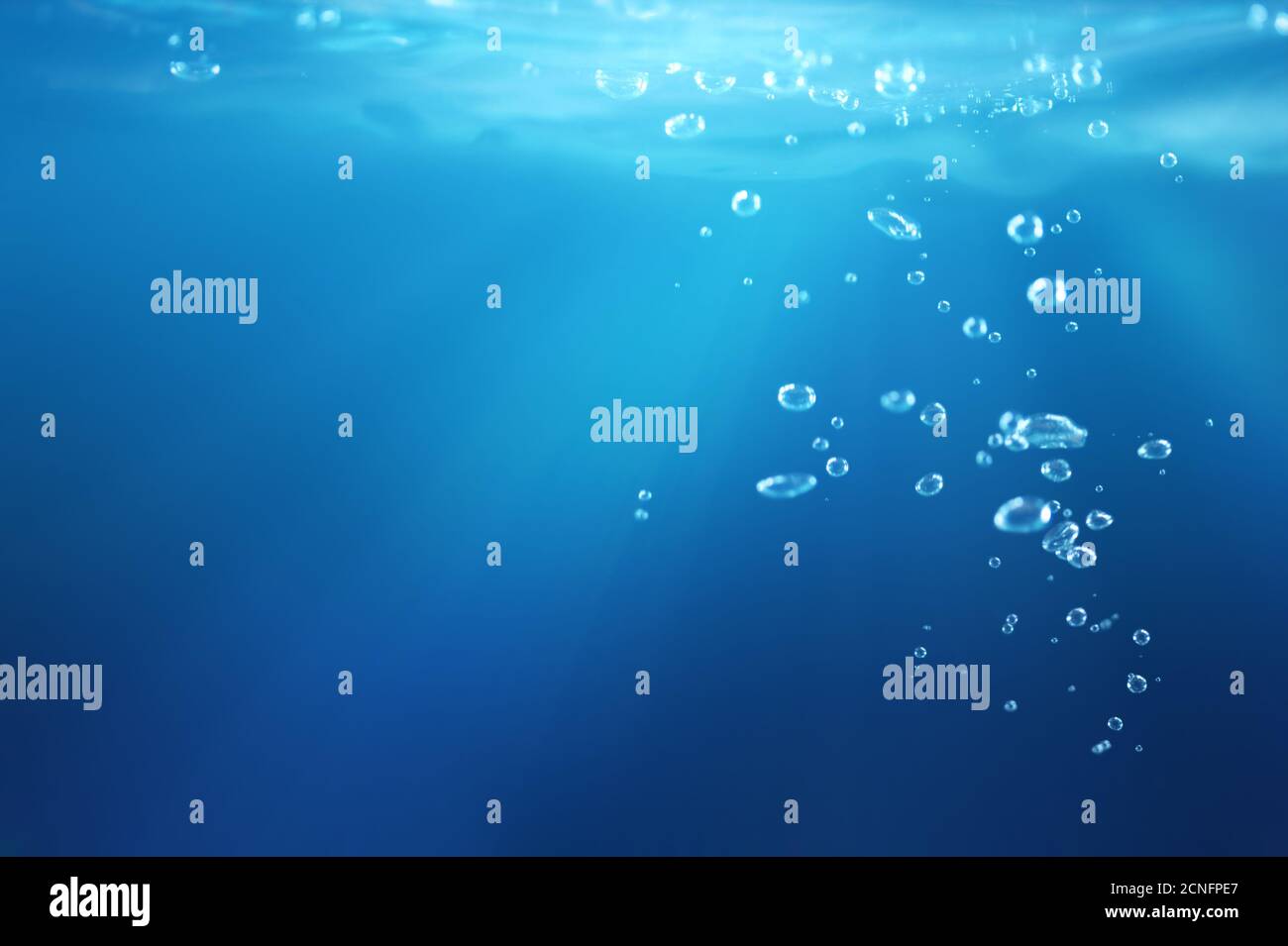 bulles d'air sous l'eau Banque D'Images