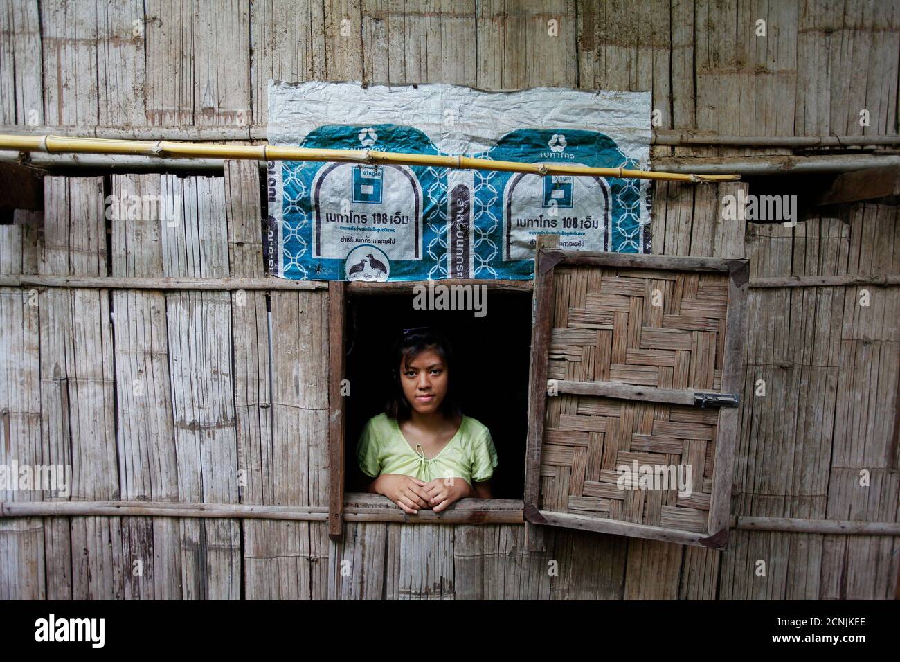 Zune Nwe Tun Oo 17 Year Old Refugee From Mandalay In Myanmar Looks Through The Window Of Her Home At The Mae La Refugee Camp Near Mae Sot June 3 12 Asked