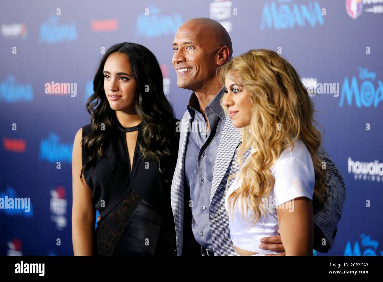 Actor Dwayne Johnson C Poses With His Daughter Simone Alexandra Johnson L And Singer Dinah Jane Hansen R At The World Premiere Of Walt Disney Animation Studios Moana As A Part Of Afi