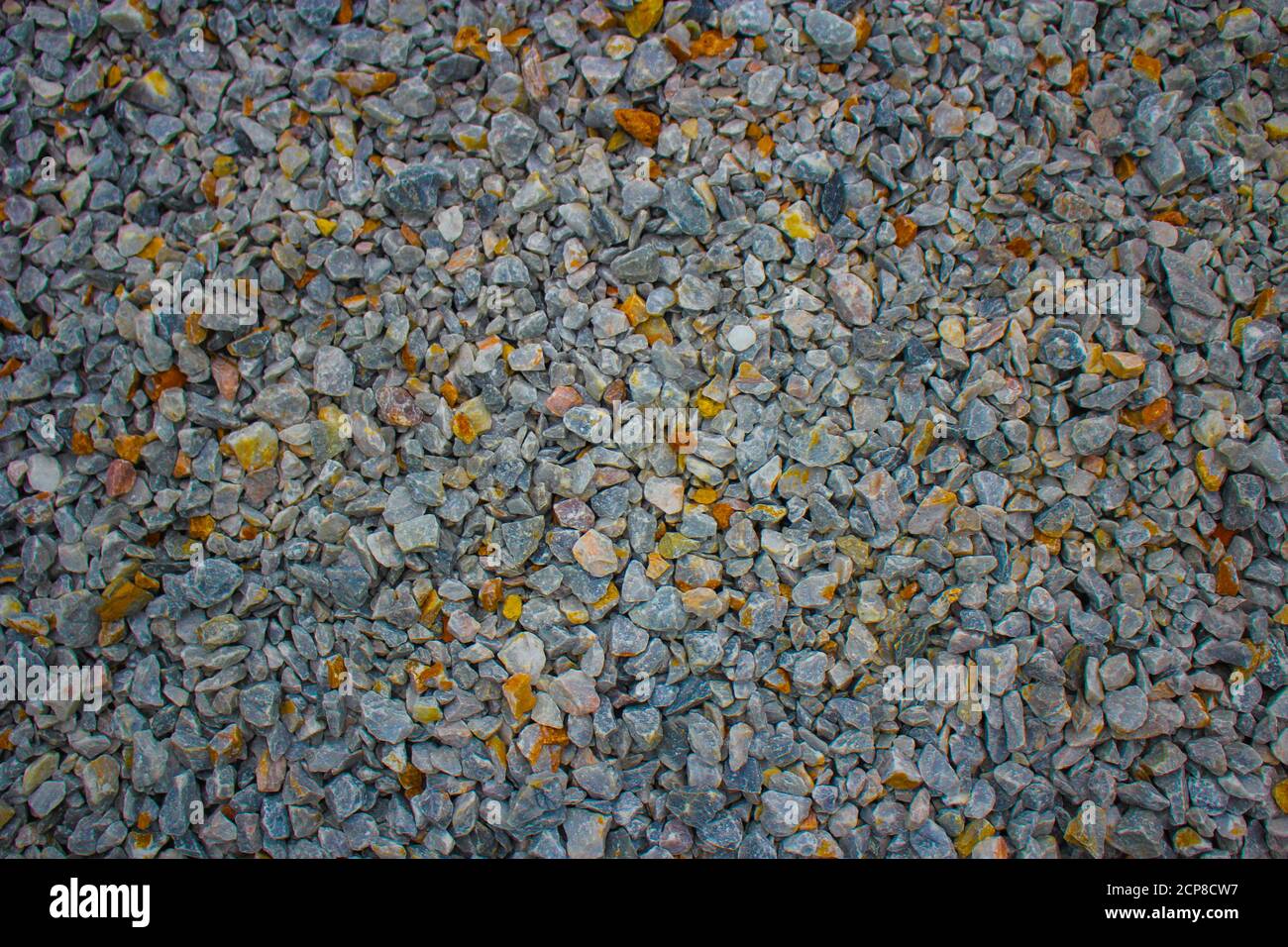 Galets colorés minéral, texture de pierre, fond de sol en gravier de pierre Banque D'Images