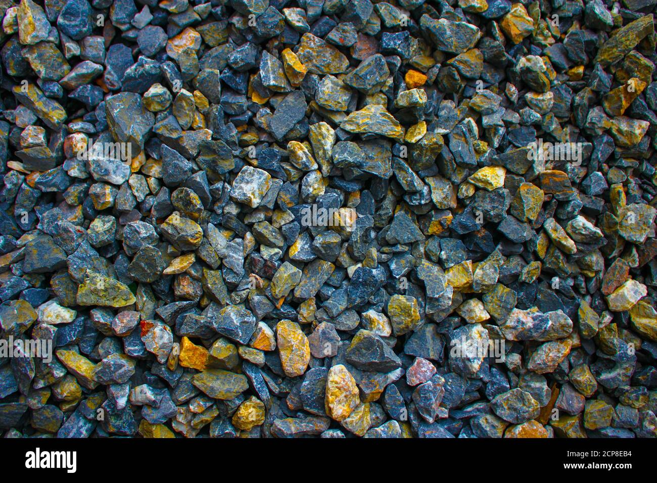 Galets colorés minéral, texture de pierre, fond de sol en gravier de pierre Banque D'Images